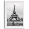 Black-and-white Eiffel Tower photo with a cyclist in the foreground, perfect for Paris wall art decor.