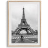 Black-and-white Eiffel Tower photo with a cyclist in the foreground, perfect for Paris wall art decor.