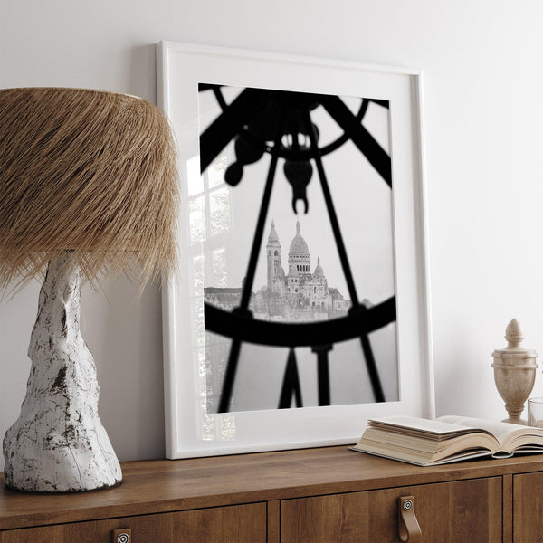 Black-and-white Paris wall decor showcasing the Sacré-Coeur Basilica framed by the Musée d’Orsay clock.