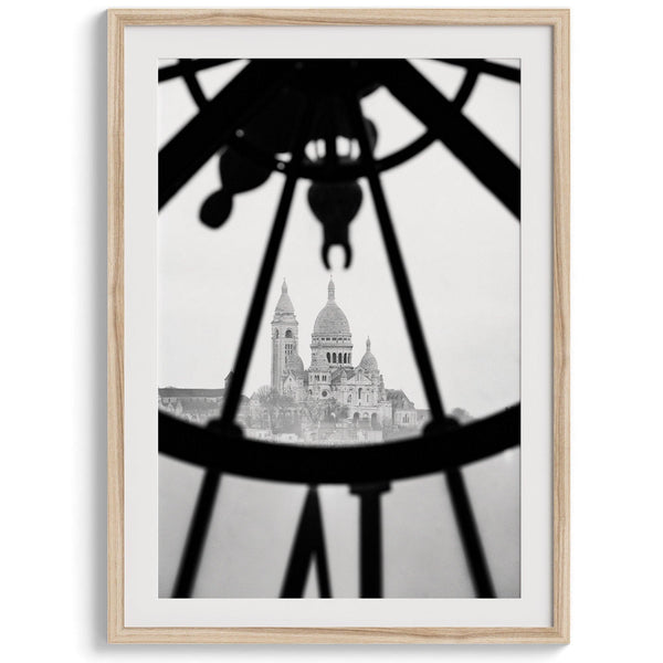 Black-and-white Paris wall decor showcasing the Sacré-Coeur Basilica framed by the Musée d’Orsay clock.