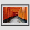 Framed photograph of the Fushimi Inari Torii Gates in Kyoto, Japan, showcasing vibrant vermilion gates.