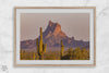 Framed photography print of an Arizona desert landscape with saguaro cacti and a sunlit mountain.