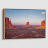 Monument Valley desert landscape print with towering sandstone buttes and a vibrant sunset sky, available as framed or canvas wall art.