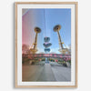 Seattle wall art featuring Space Needle reflected on Museum of Pop Culture walls with pink and blue tones.