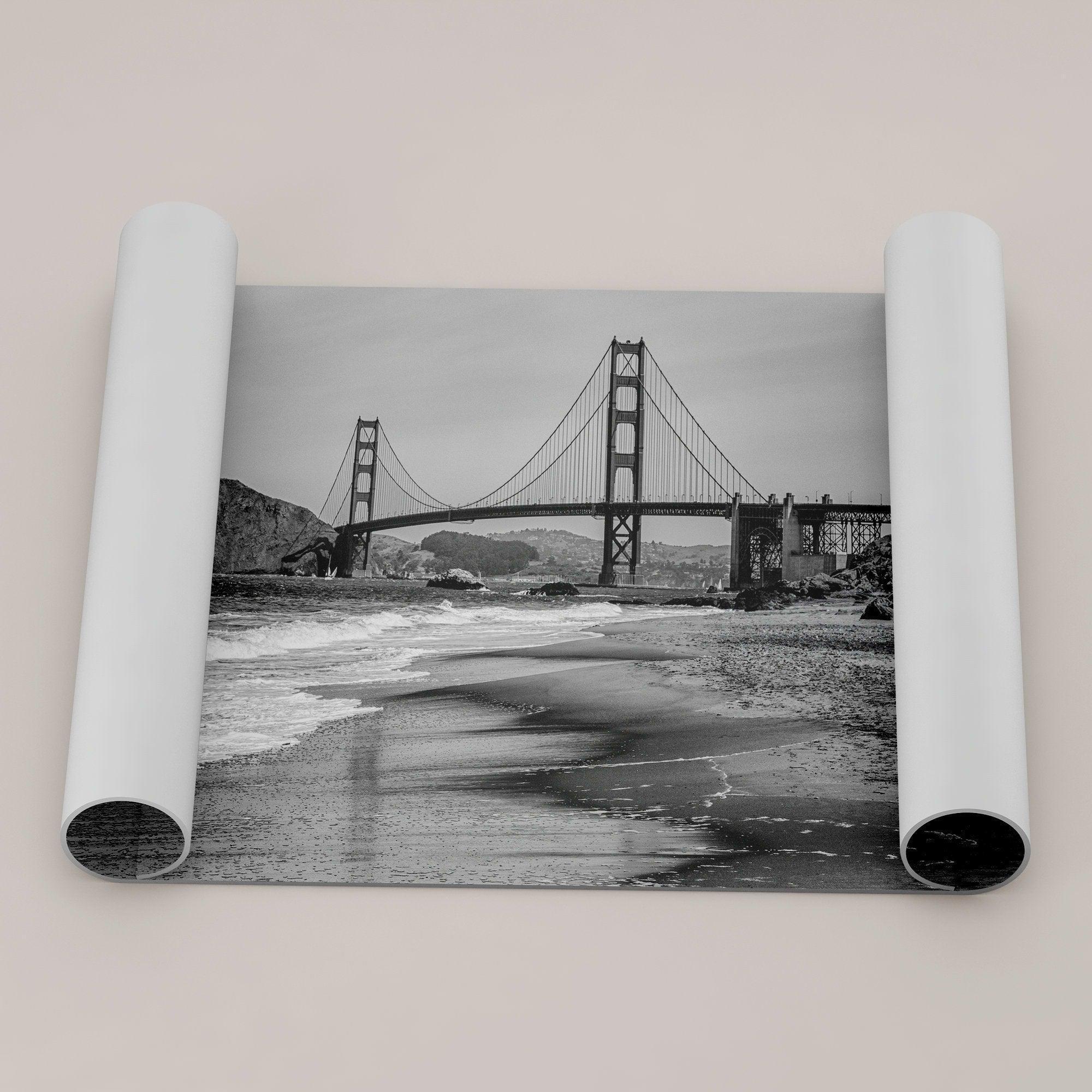 Fine art black and white print of Golden Gate Bridge from Baker Beach, San Francisco. Bridge with reflection in beach surf. Framed or unframed option available