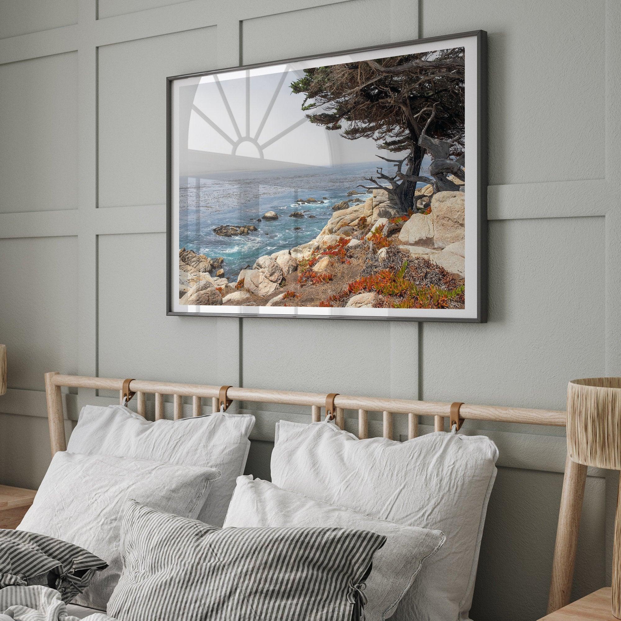 This stunning piece of art captures the beauty and drama of California's rugged coastline. This large framed or unframed ocean wall art showcases a large coastal tree overlooking the ocean near Monterey on Route 1.