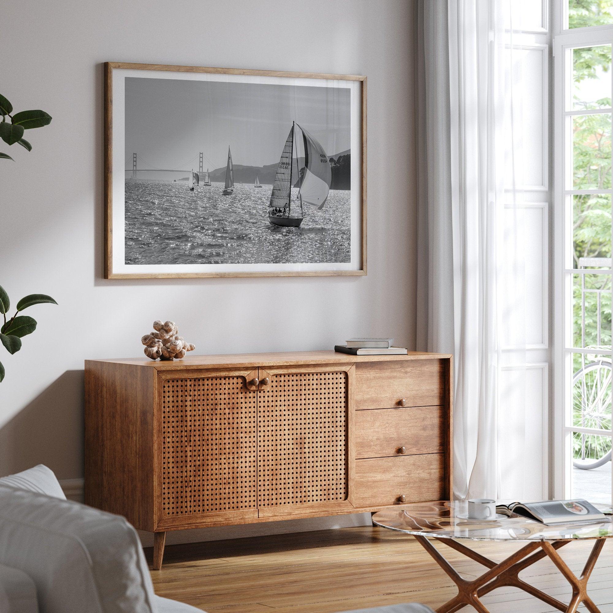 A fine art black and white framed or unframed print of the sailboats in the San Francisco Bay with the backdrop of the Golden Gate Bridge.