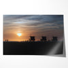 Step into Venice Beach with our fine art beach sunset framed or unframed print. The print showcases the beach in sunset with the silhouettes of the famous lifeguard towers and people in the sunset.