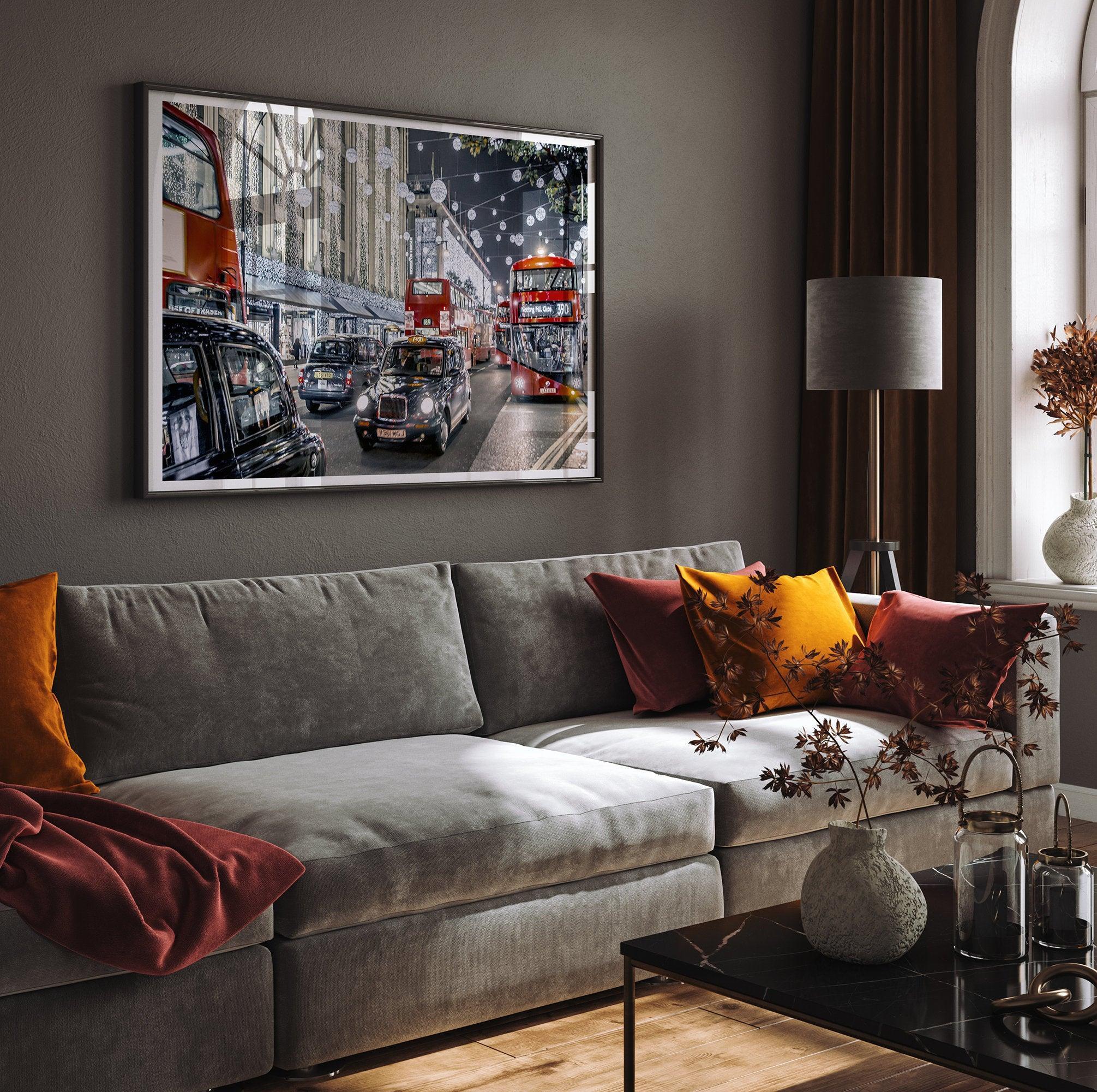 A fine art photography print of a vibrant and lively street in London during the Christmas holidays. This London wall art shows double-decker buses and black taxis, and the streets are adorned with bright holiday lights and festive decorations