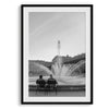 A wall art set of 2 prints from Paris. Left print - Eiffel Tower from Jardin de la Tour Eiffel. Right print - couple sitting in front of the fountain in Palais Royal Garden.