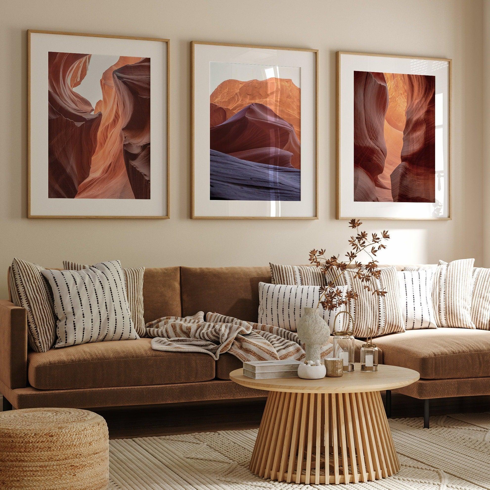 A set of 3 wall art framed or unframed prints of antelope canyon. Each print in this gallery wall set shows a different scene from the stunning canyon with its unique colors and textures.