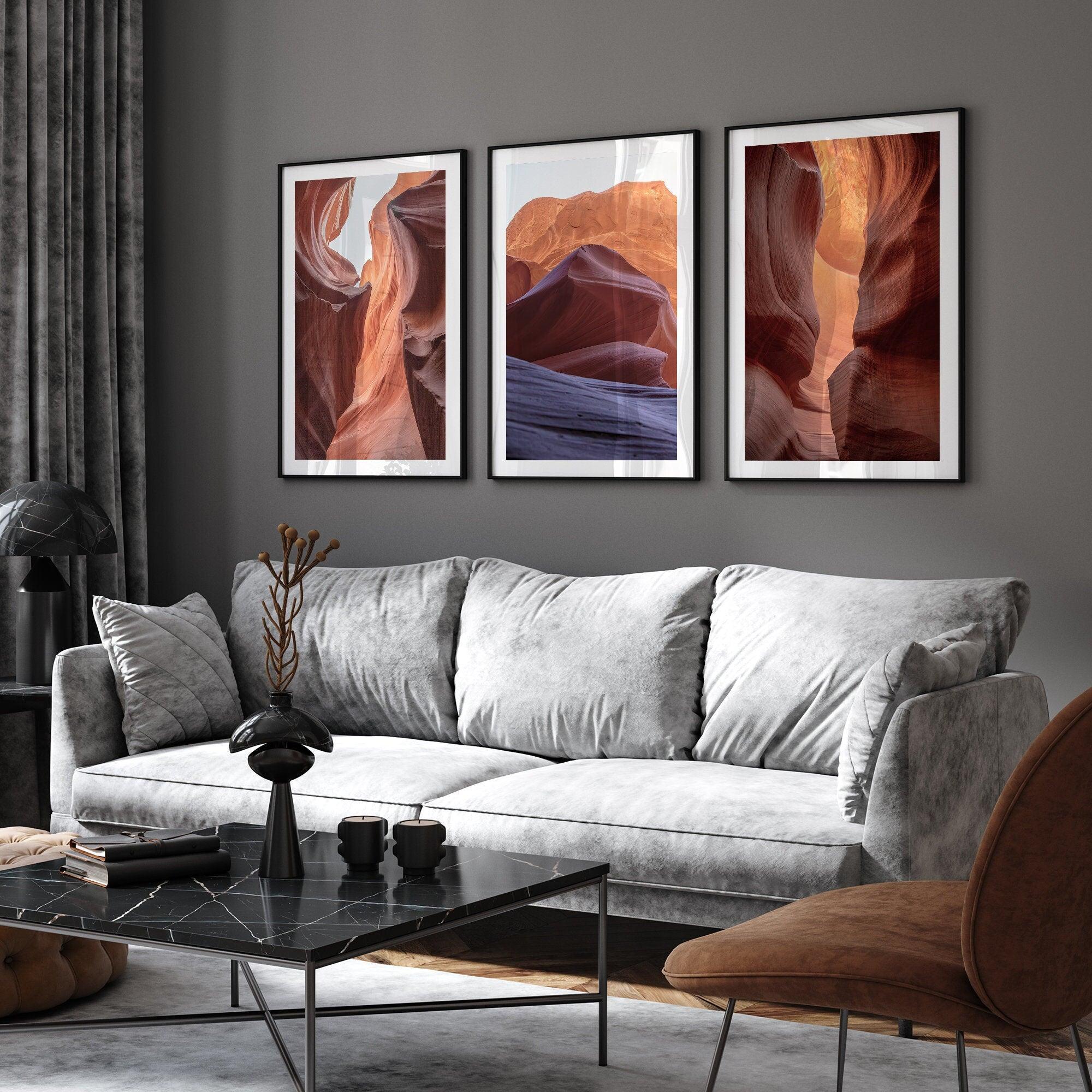 A set of 3 wall art framed or unframed prints of antelope canyon. Each print in this gallery wall set shows a different scene from the stunning canyon with its unique colors and textures.