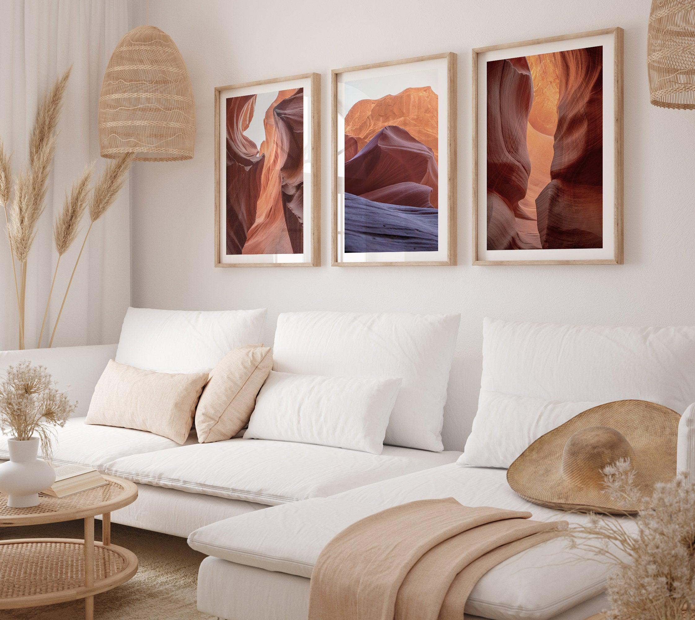 A set of 3 wall art framed or unframed prints of antelope canyon. Each print in this gallery wall set shows a different scene from the stunning canyon with its unique colors and textures.