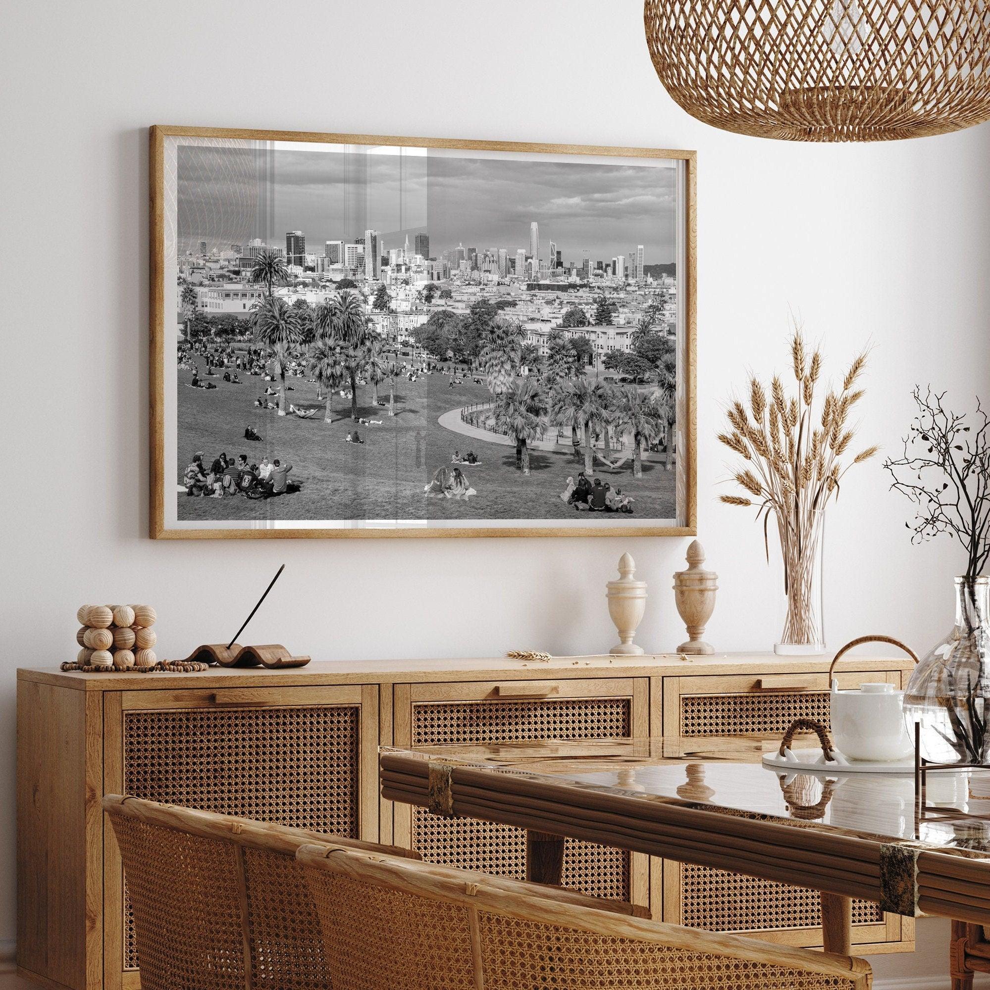 Black and white fine art print of Mission Dolores Park in San Francisco showcasing picnic blankets and people enjoying a quiet afternoon with the city skyline in the backdrop.