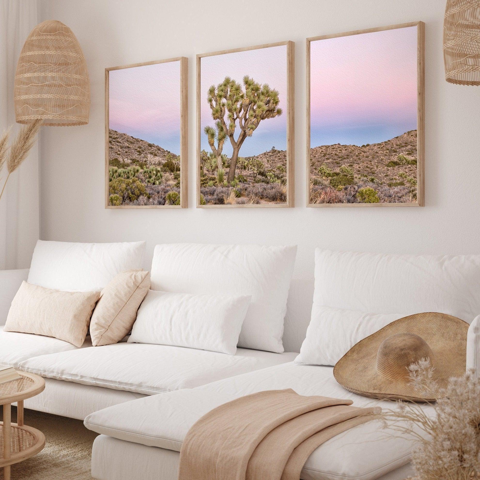 A canvas large wall art set of Joshua Tree National Park. This canvas print showcases a stunning lone Joshua tree standing in the desert with desert plantation all around and breathtaking pink sunset in the backdrop.