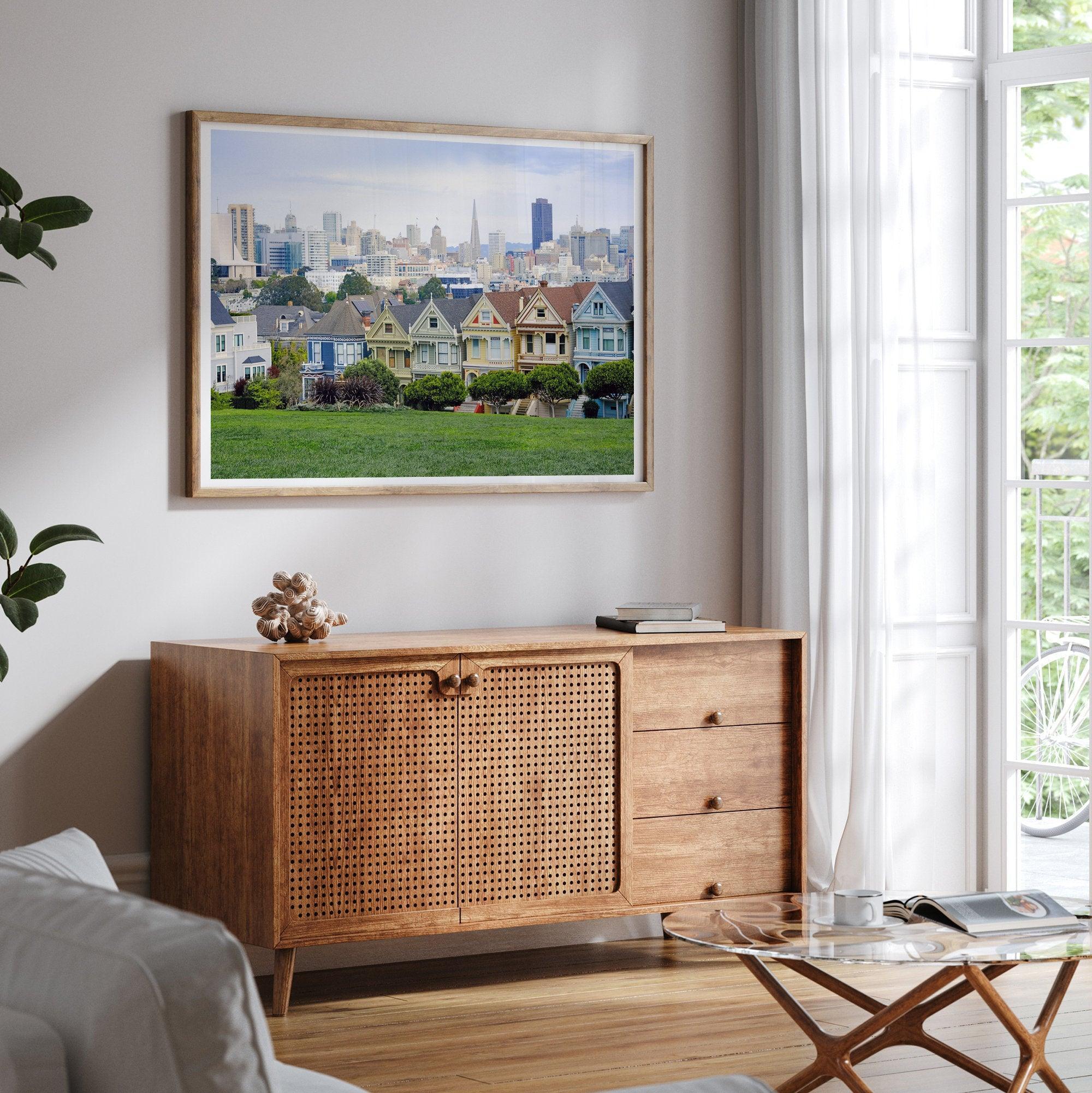 A fine art framed print of the famous colorful painted Ladies Victorian houses in Alamo Square, San Francisco.