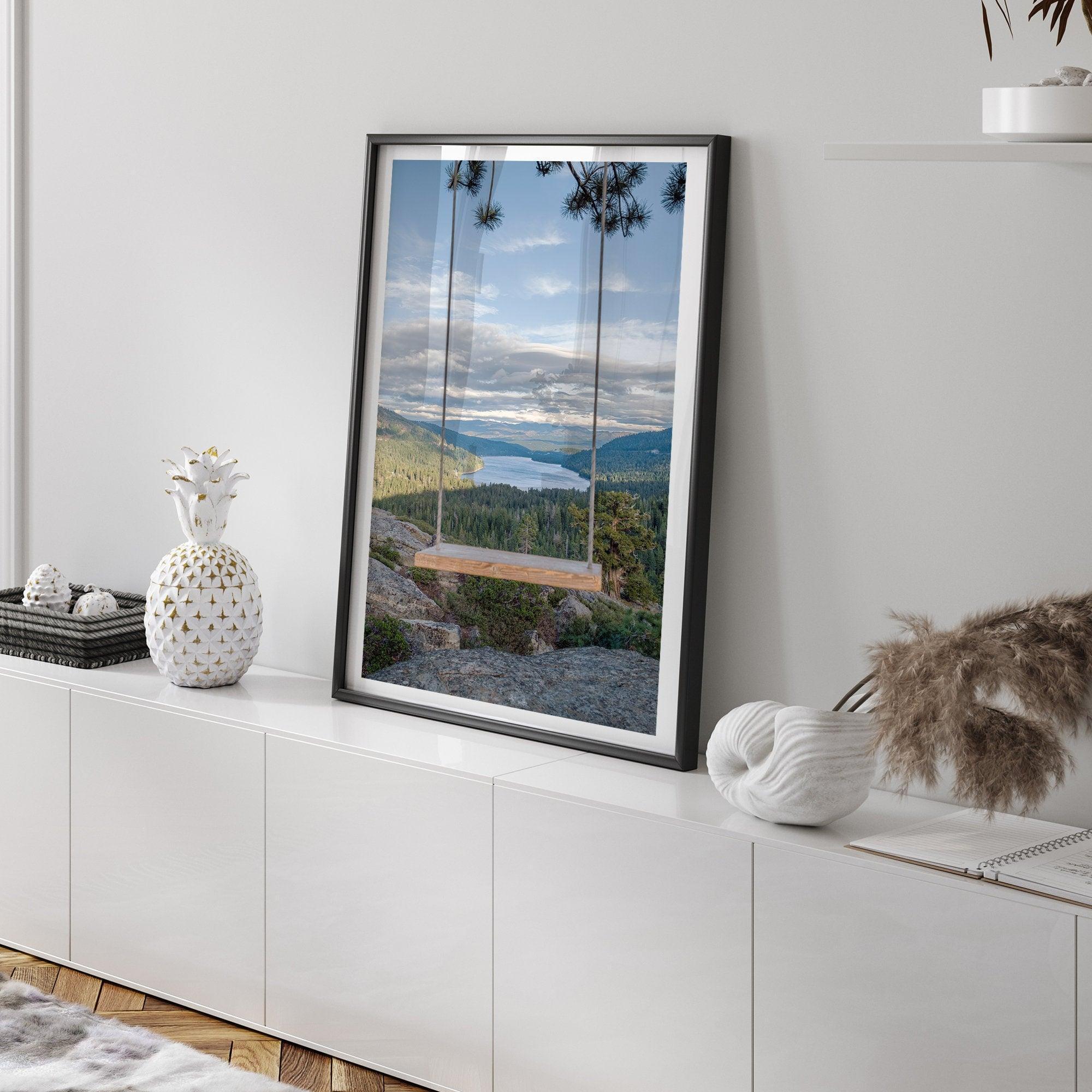 A fine art-inspiring photo print showcasing a swing on a tree with the backdrop of Donner Lake and the Pacific Northwest mountains.