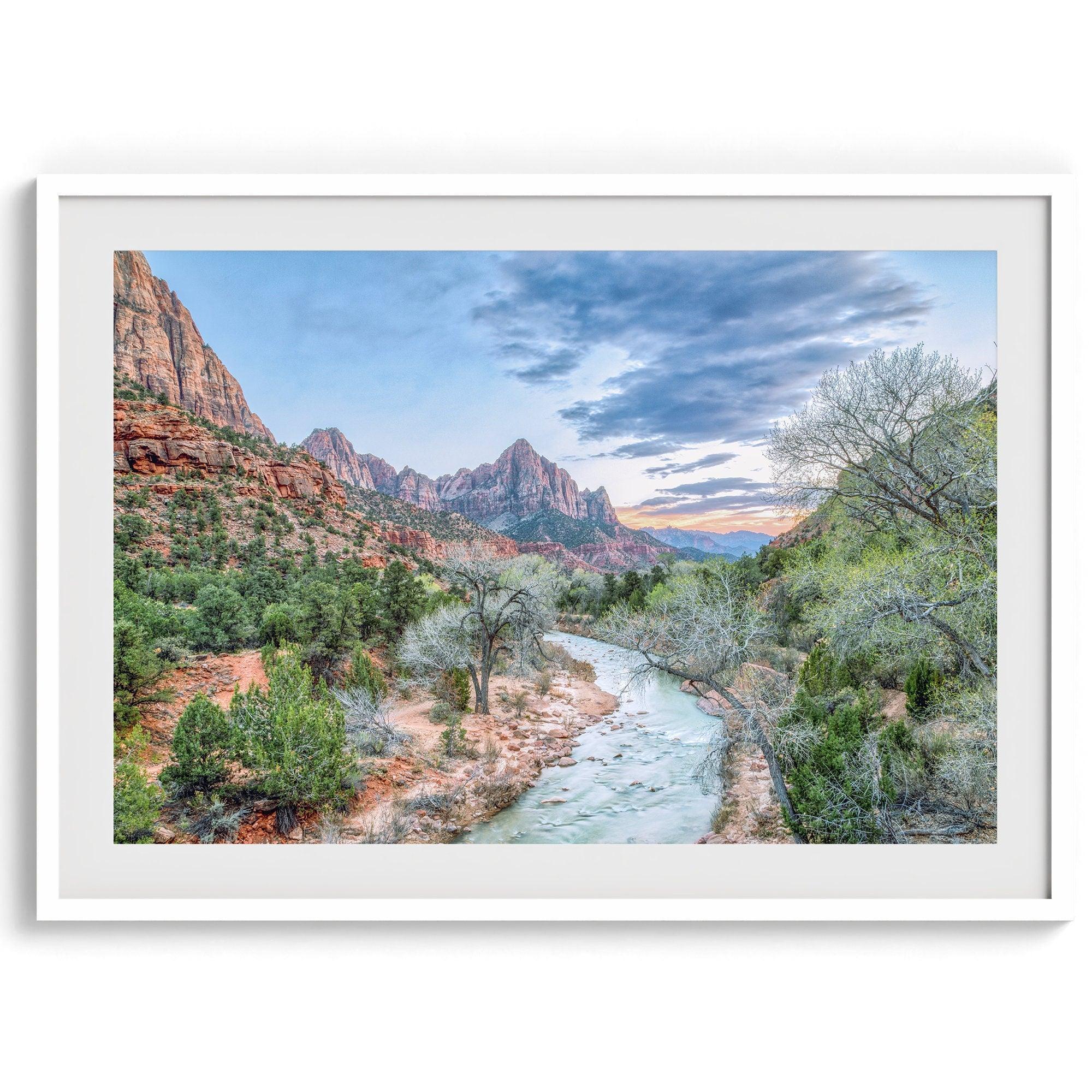 A framed fine art landscape photography print of Zion National Park showing a beautiful river, trees, and desert landscape with the backdrop of Zion mountain range. This Utah wall art is perfect for nature photography and desert art enthusiasts.