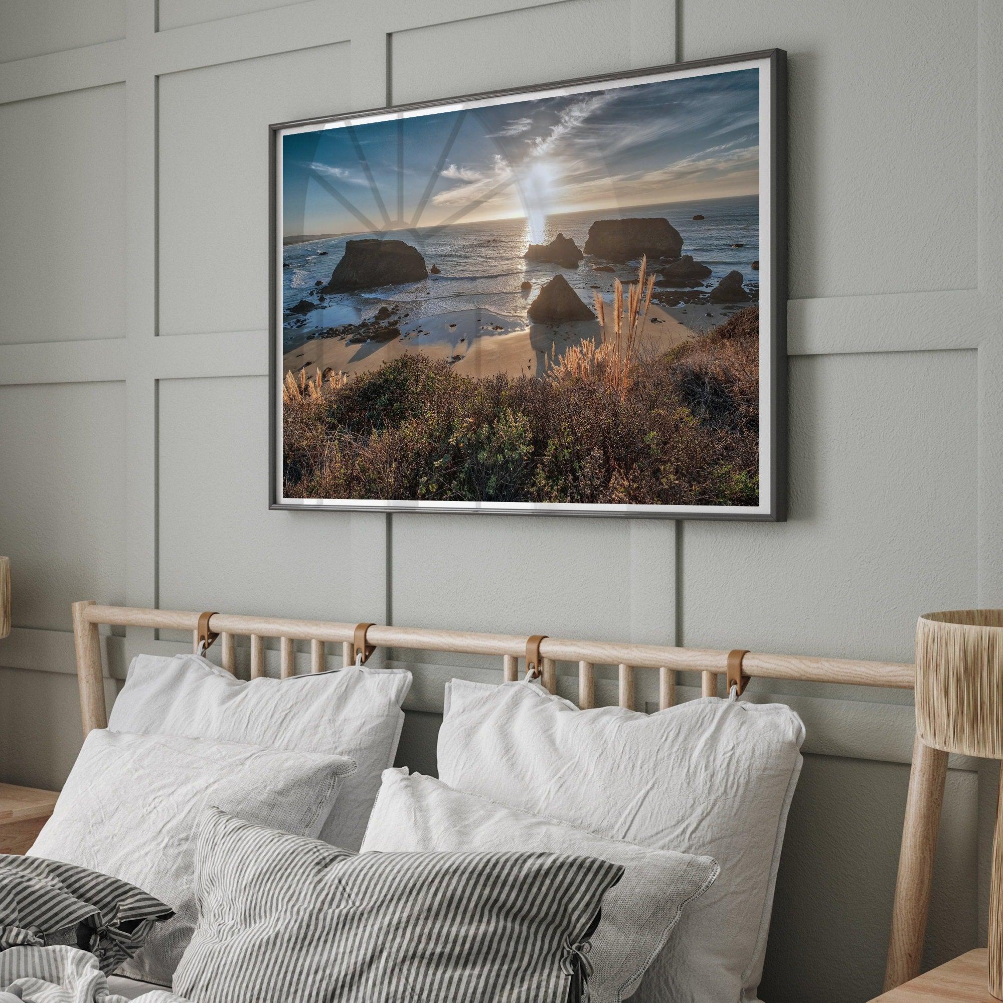 A fine art unframed or framed beach print showing the breathtaking beach of Fort Bragg, California, as the sunset ray of lights hits the ocean and the vast sea stacks.