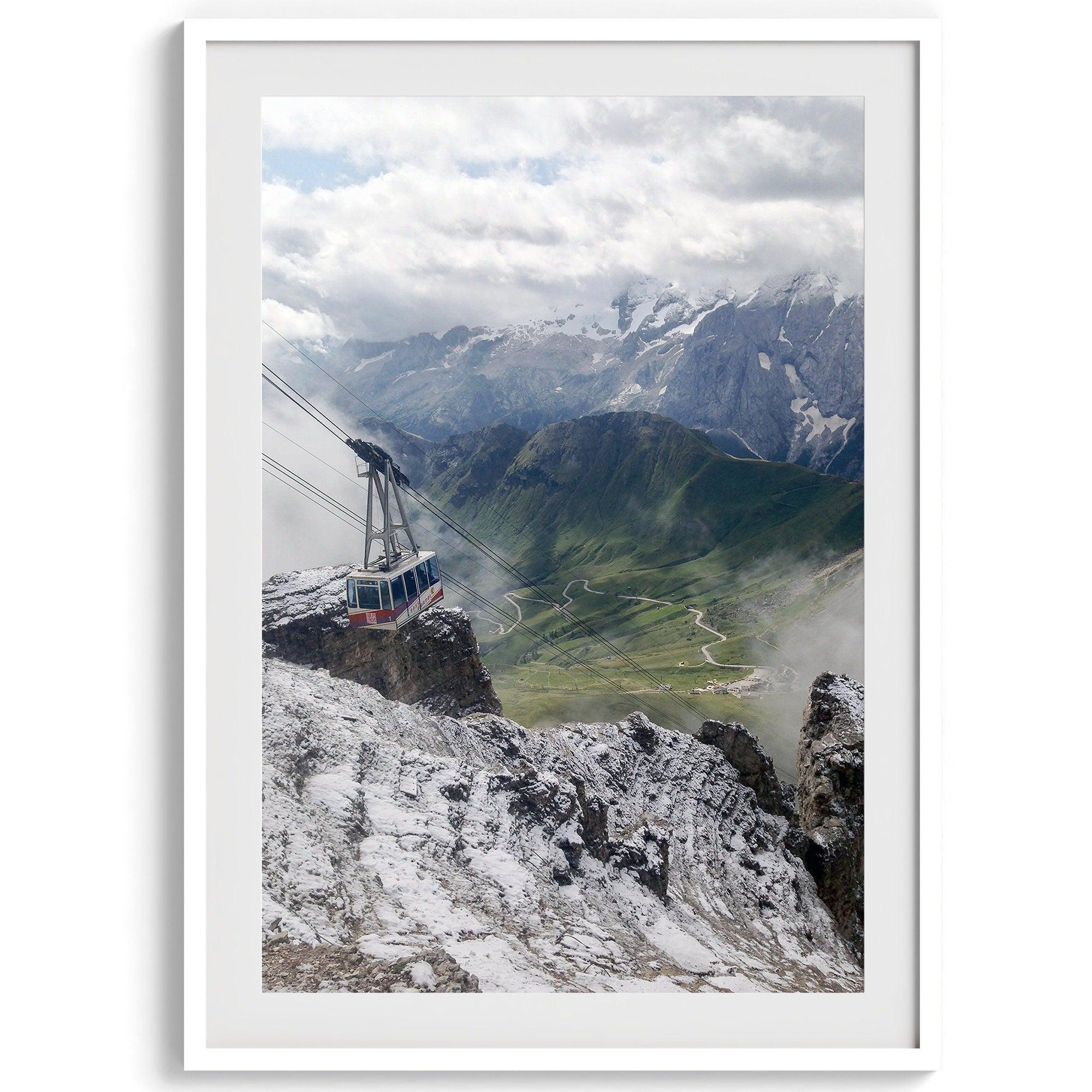 Step into the breathtaking view from the top of Pordoi Pass in the Dolomites Mountains with this fine art Northern Italy photography print. This mountain wall art showcases the green valley and snow-covered mountains.