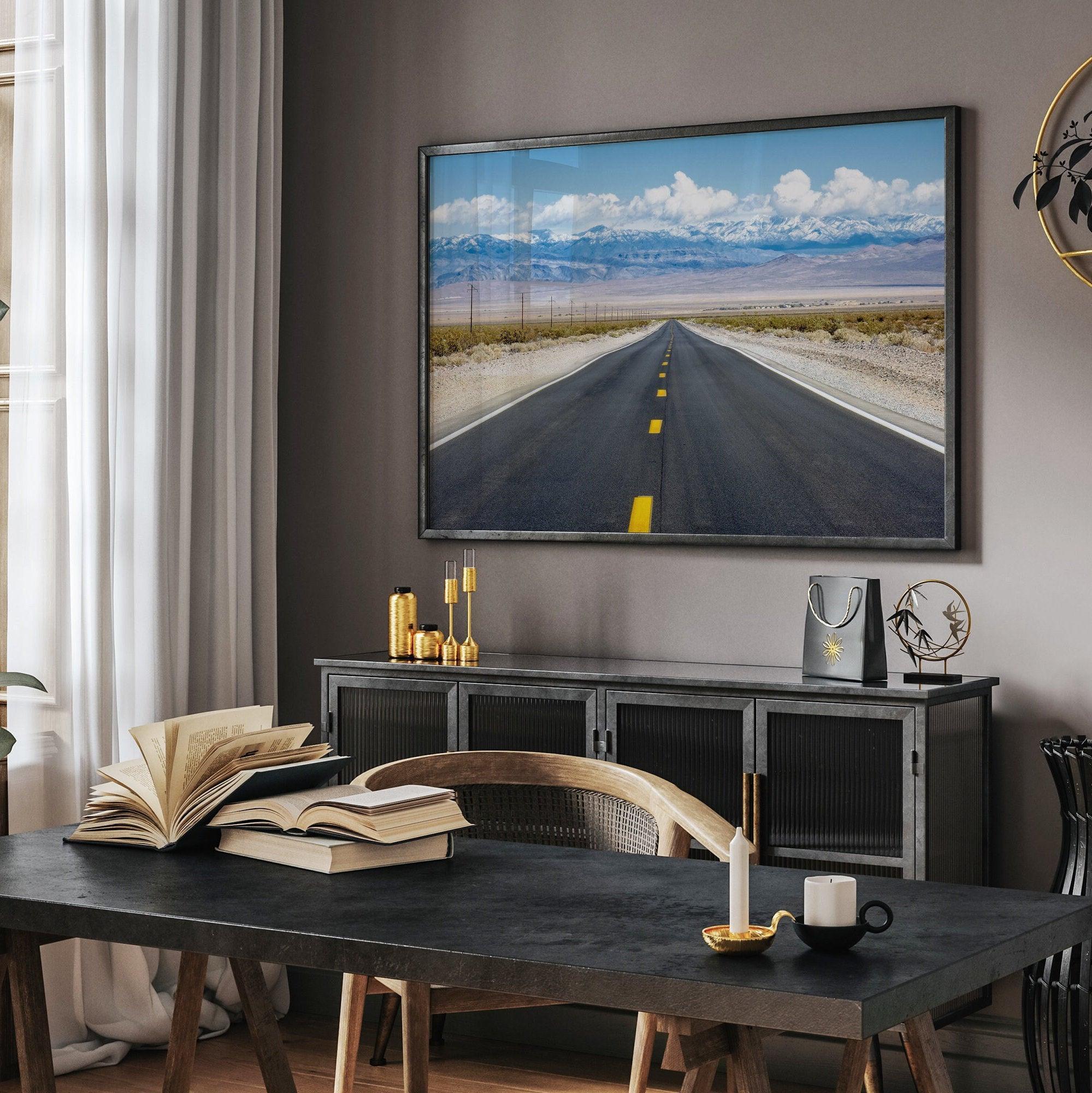 This stunning piece of desert wall art will take your breath away. This beautifully framed picture of a Death Valley National Park road leading towards the snow-covered mountains at the end of the desert will impress when hung on your walls.