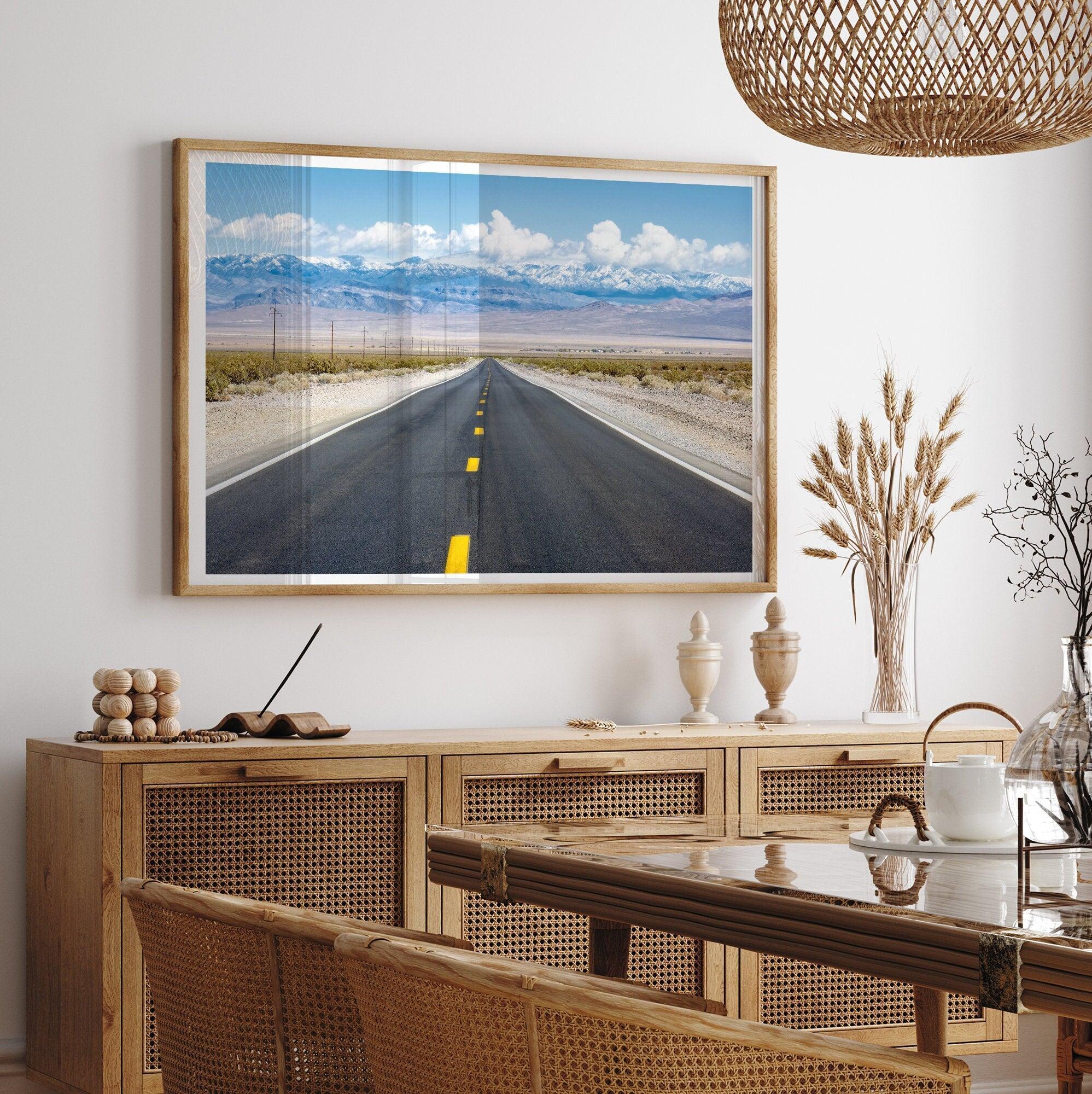 This stunning piece of desert wall art will take your breath away. This beautifully framed picture of a Death Valley National Park road leading towards the snow-covered mountains at the end of the desert will impress when hung on your walls.