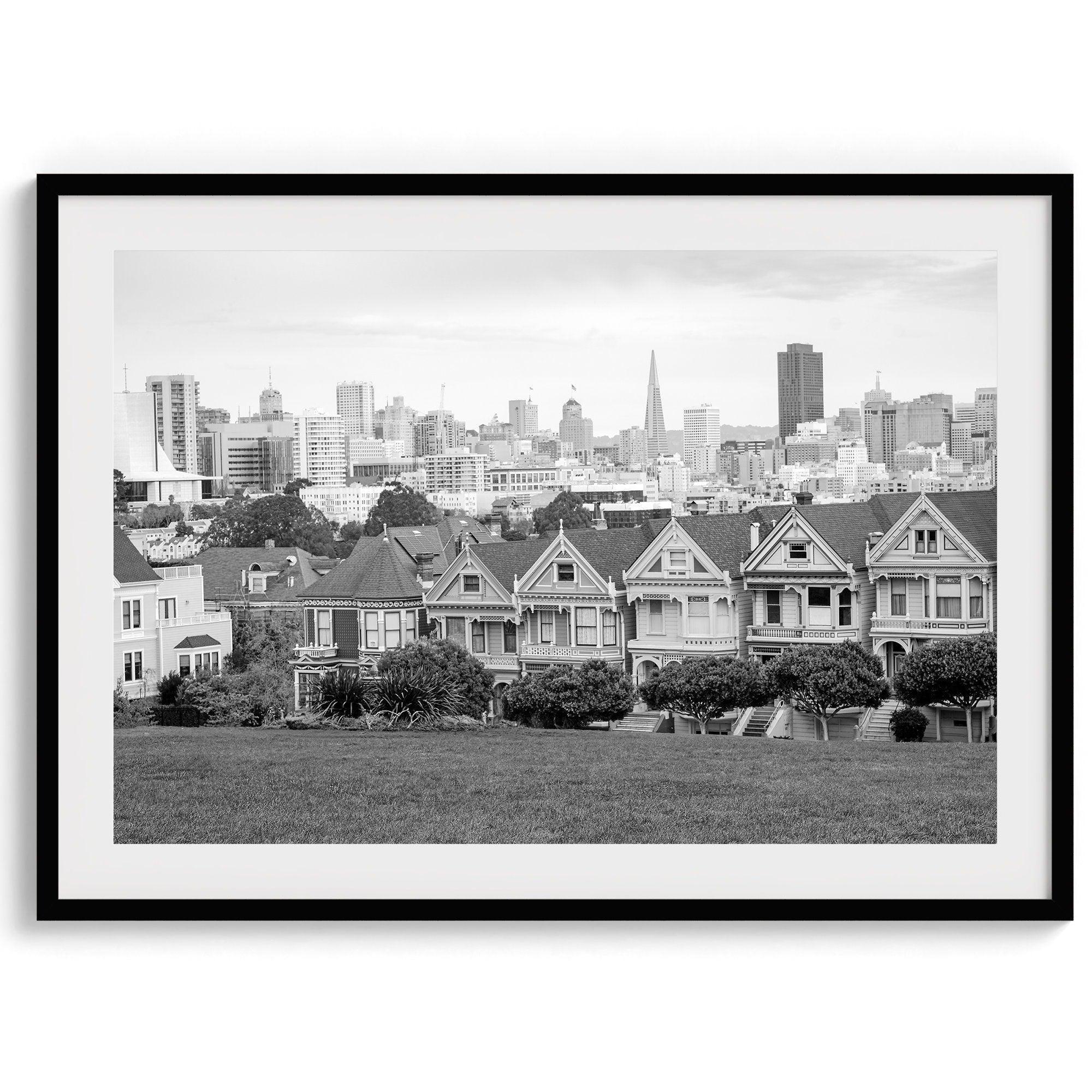 A fine art framed print of the famous colorful painted Ladies Victorian houses in Alamo Square, San Francisco.