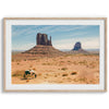 A framed or unframed fine art photography desert print of a horse in Monument Valley, Utah. This wall art features unique rock formations native to the Monument Valley area. This horse wall art comes in different sizes, including extra large.