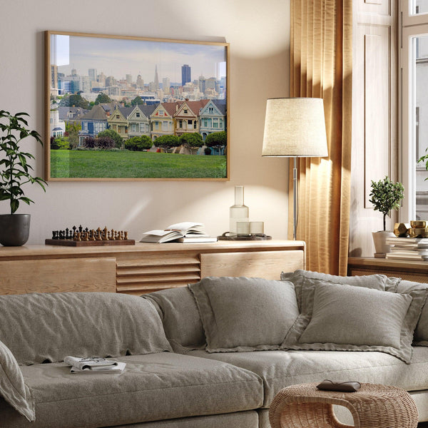 A fine art framed print of the famous colorful painted Ladies Victorian houses in Alamo Square, San Francisco.