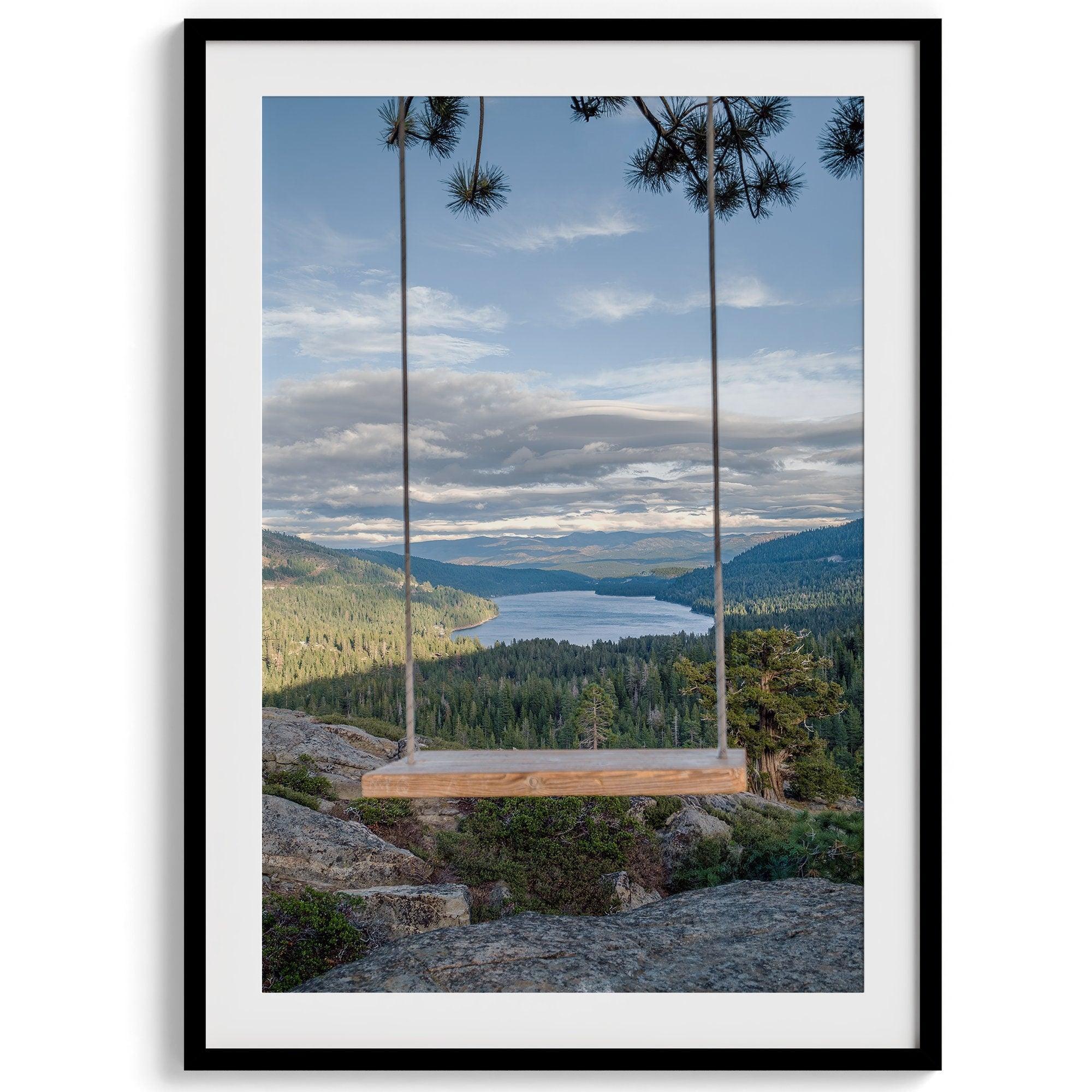 A fine art-inspiring photo print showcasing a swing on a tree with the backdrop of Donner Lake and the Pacific Northwest mountains.