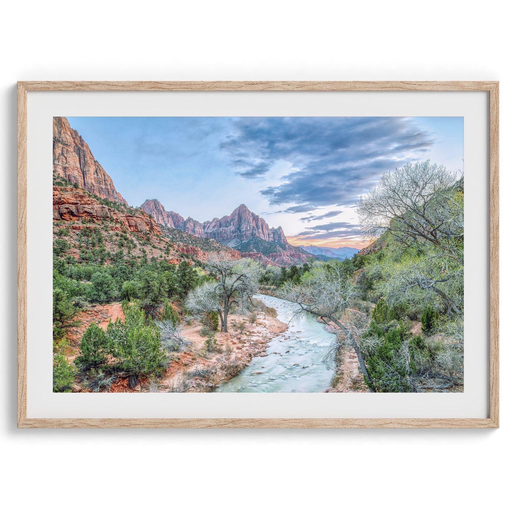 A framed fine art landscape photography print of Zion National Park showing a beautiful river, trees, and desert landscape with the backdrop of Zion mountain range. This Utah wall art is perfect for nature photography and desert art enthusiasts.