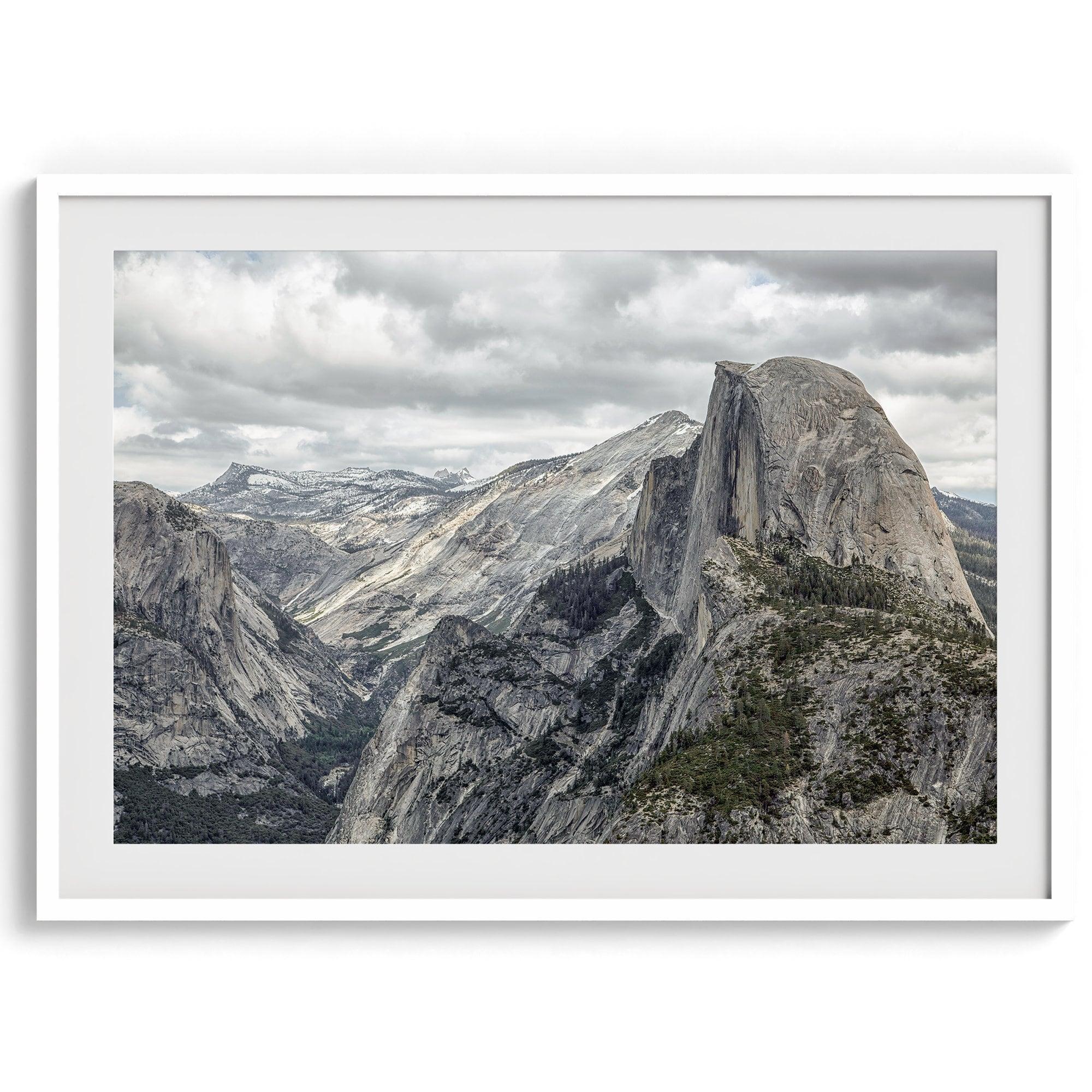 A fine art framed or unframed print showcasing the stunning half-dome mountain in Yosemite national park. The picture was shot an edited as an HDR photograph adding more depth to this beautiful mountain wall art.