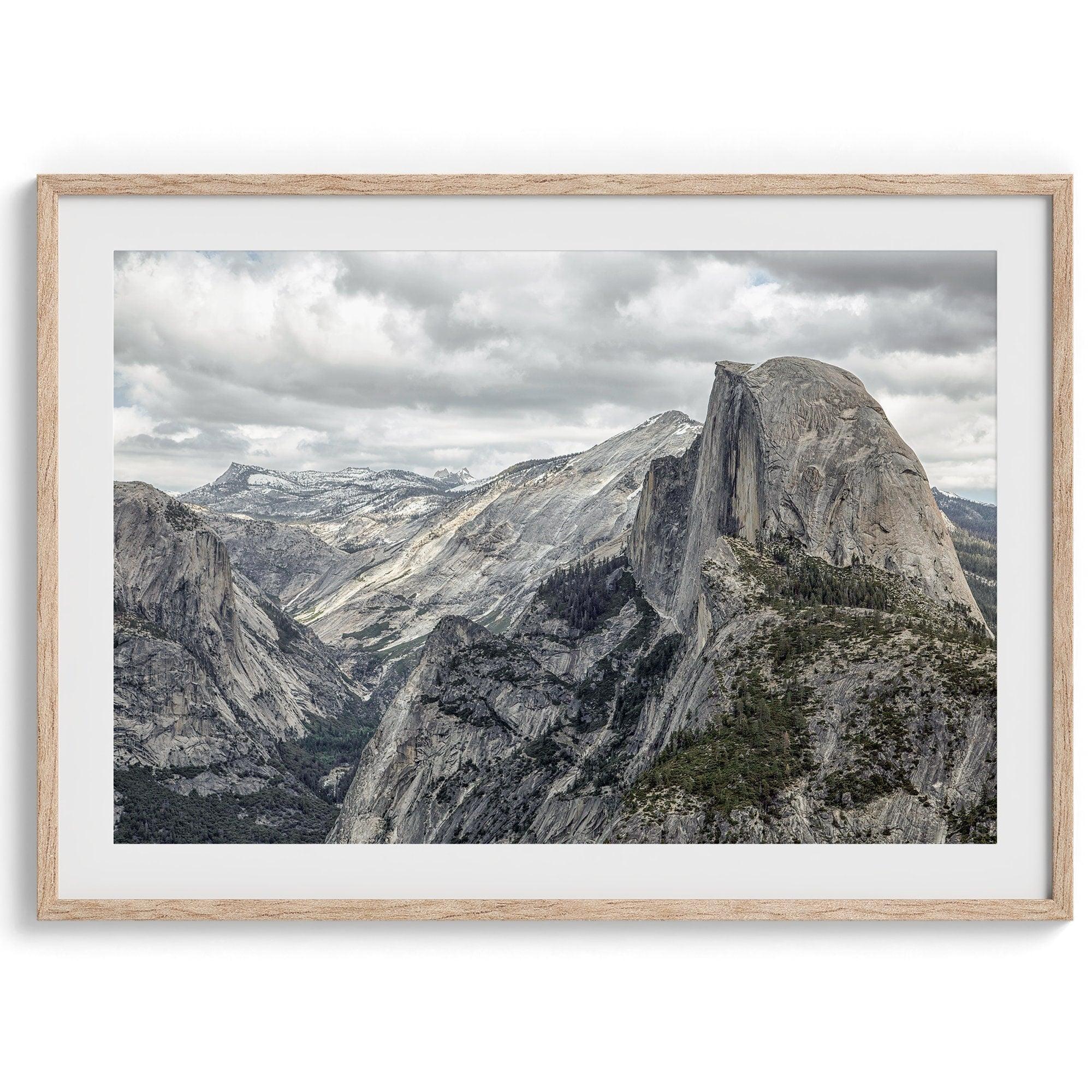 A fine art framed or unframed print showcasing the stunning half-dome mountain in Yosemite national park. The picture was shot an edited as an HDR photograph adding more depth to this beautiful mountain wall art.