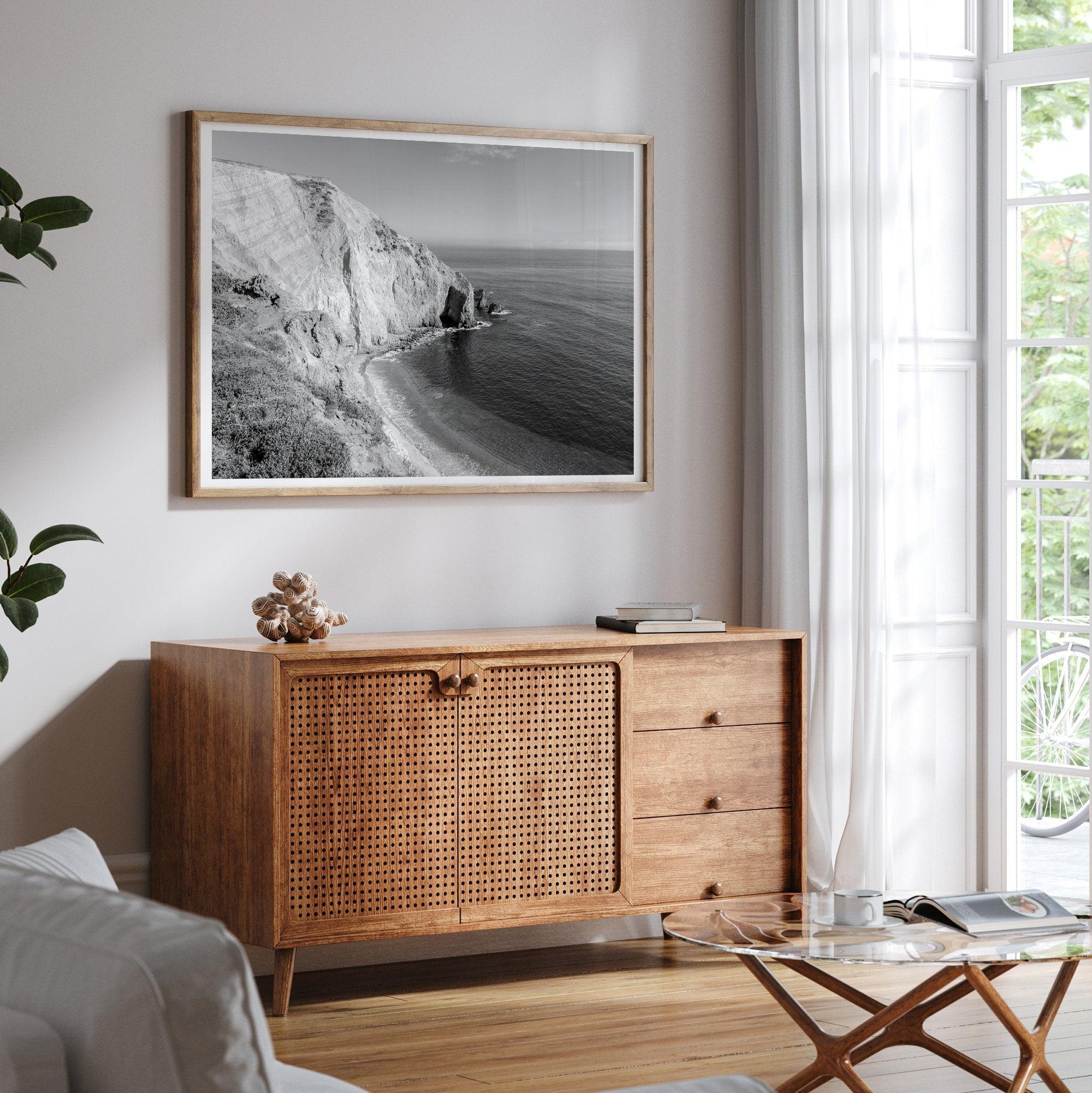 A black and white fine art ocean wall art print of a coastal cliff and beautiful beach in Chimney Rock trail, Point Reyes, California.