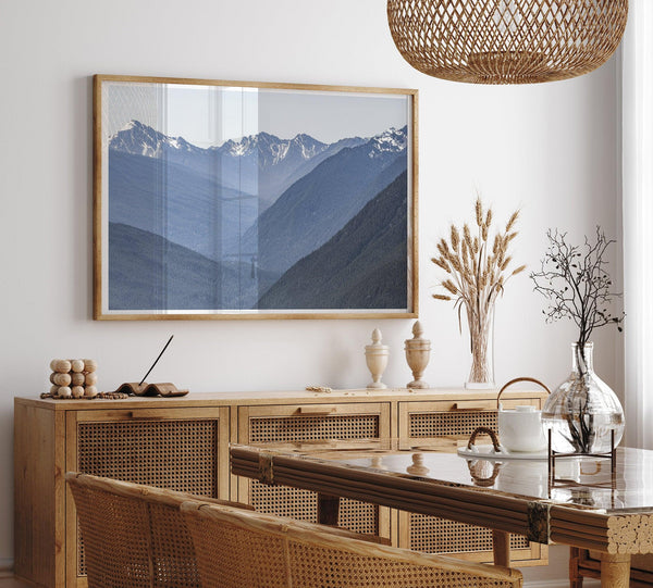 A fine art mountain range print. This mountain wall art showcases the layered misty blue mountains of Olympic National Park in Washington.