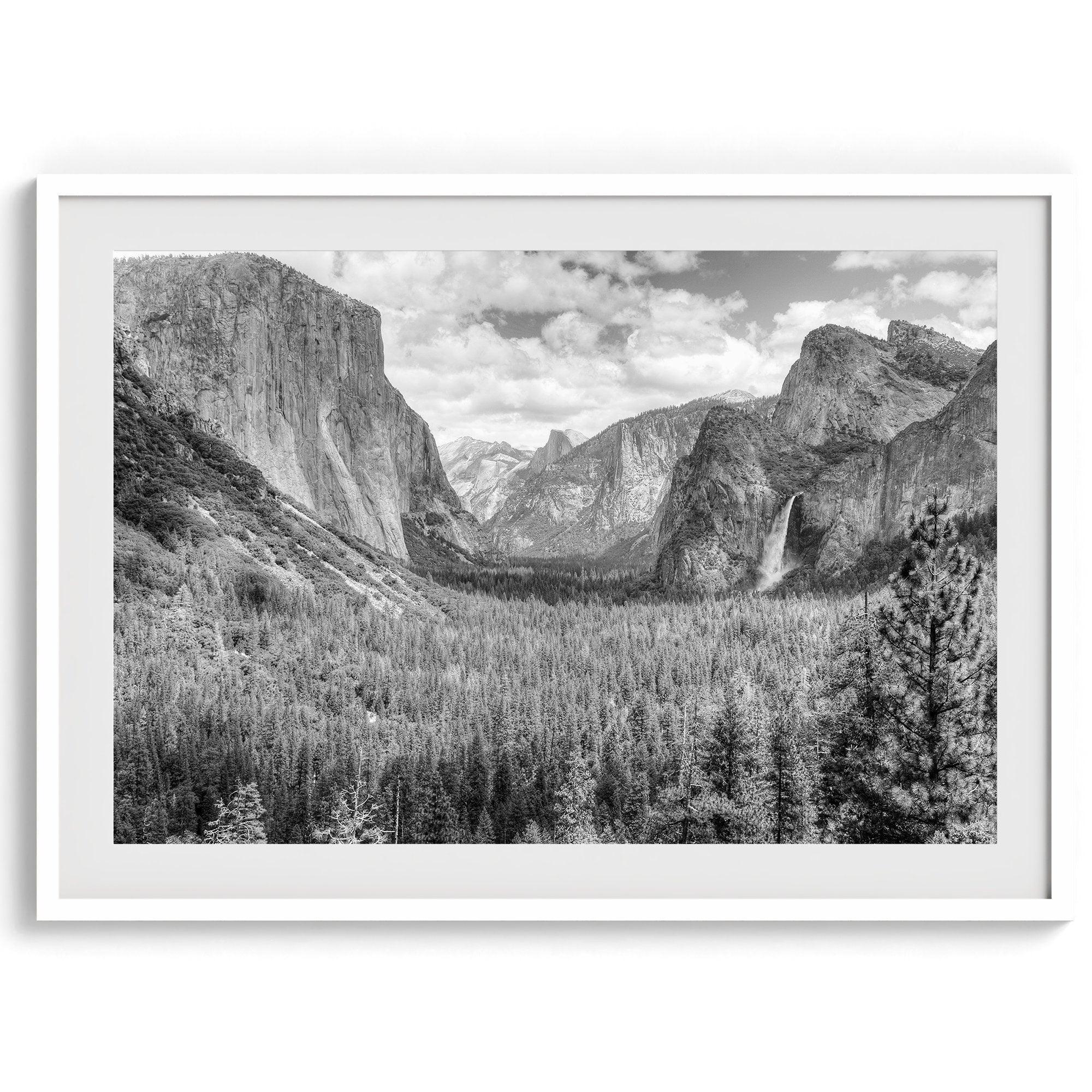 A breathtaking fine art black and white print of Yosemite valley during spring when the waterfalls are in full power.