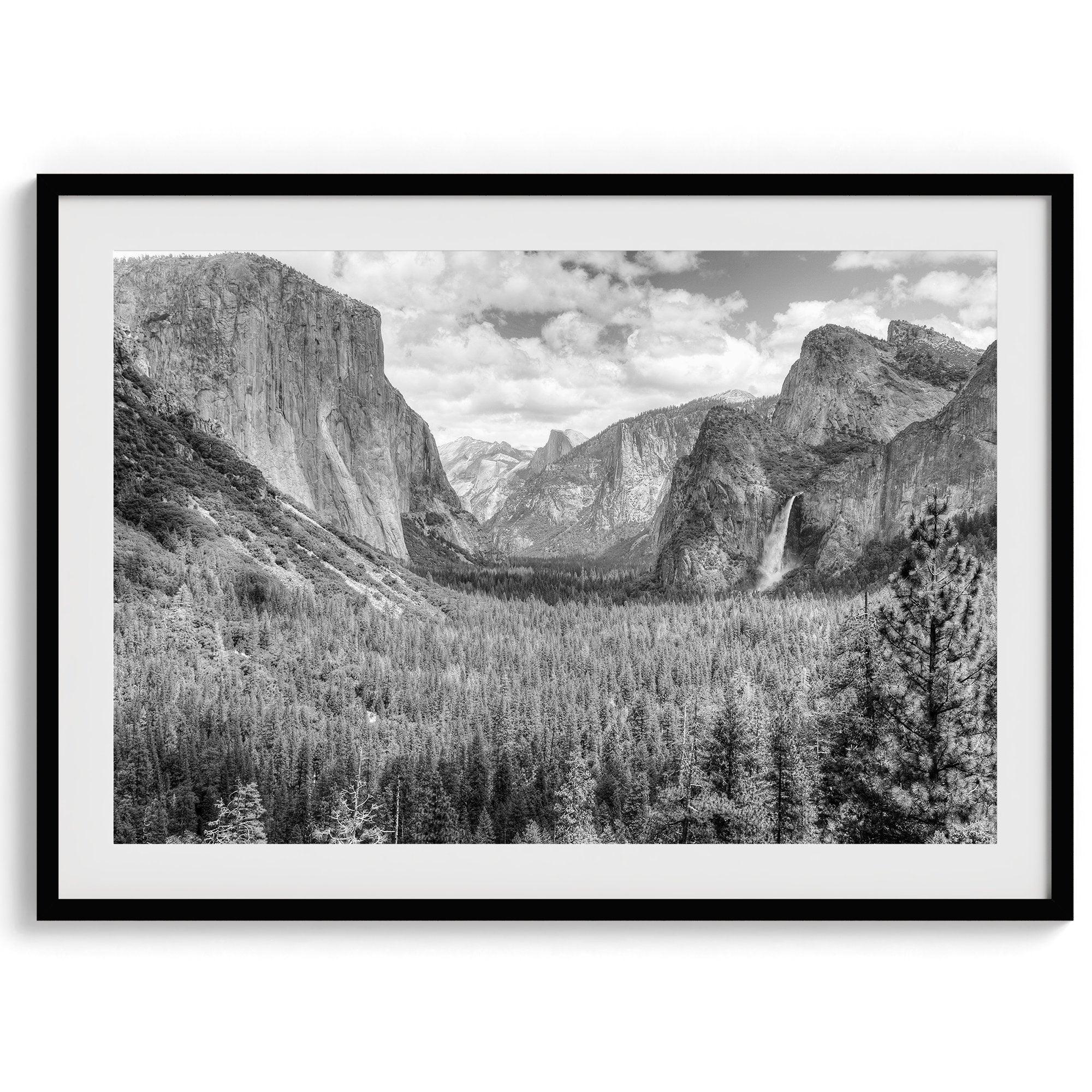 A breathtaking fine art black and white print of Yosemite valley during spring when the waterfalls are in full power.