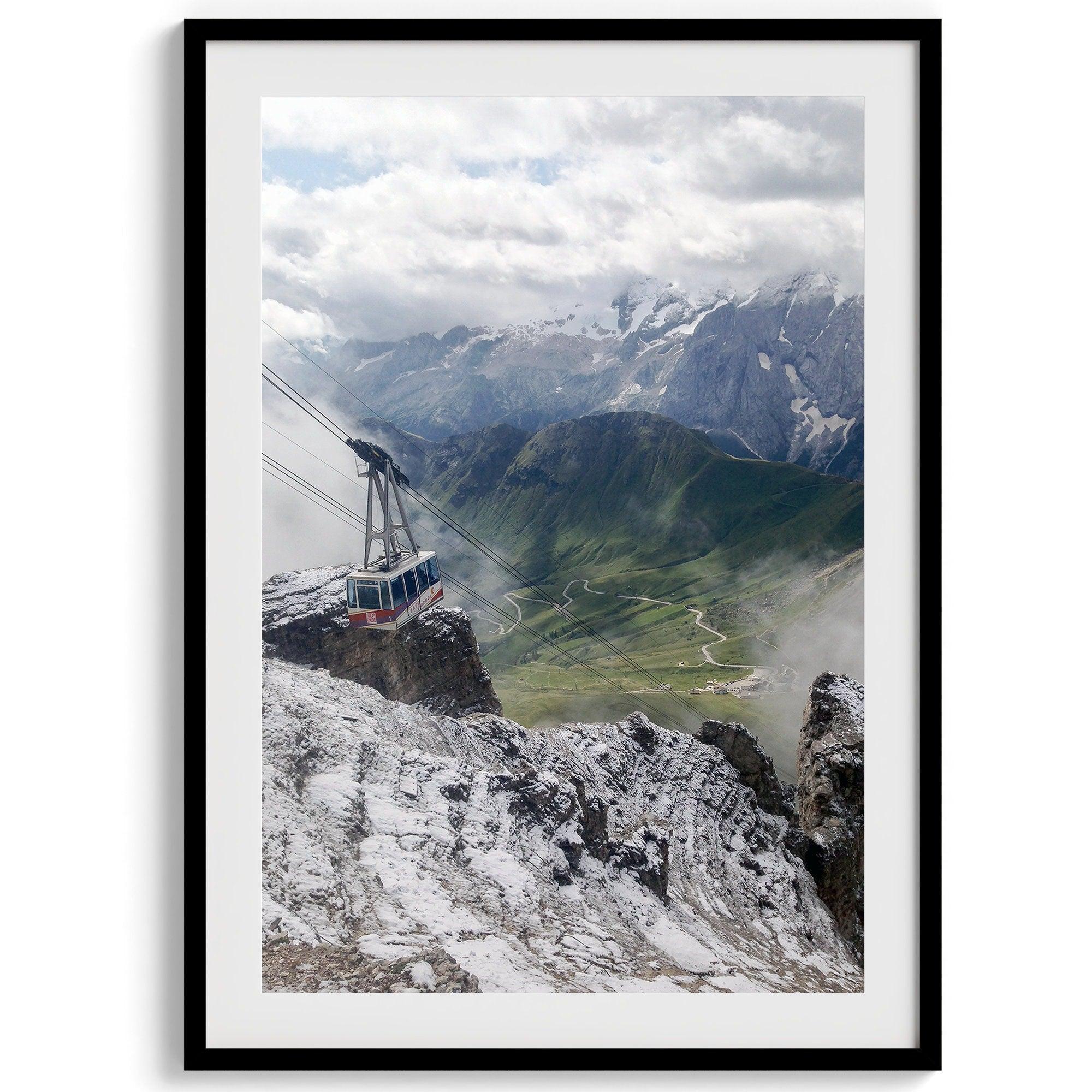 Step into the breathtaking view from the top of Pordoi Pass in the Dolomites Mountains with this fine art Northern Italy photography print. This mountain wall art showcases the green valley and snow-covered mountains.