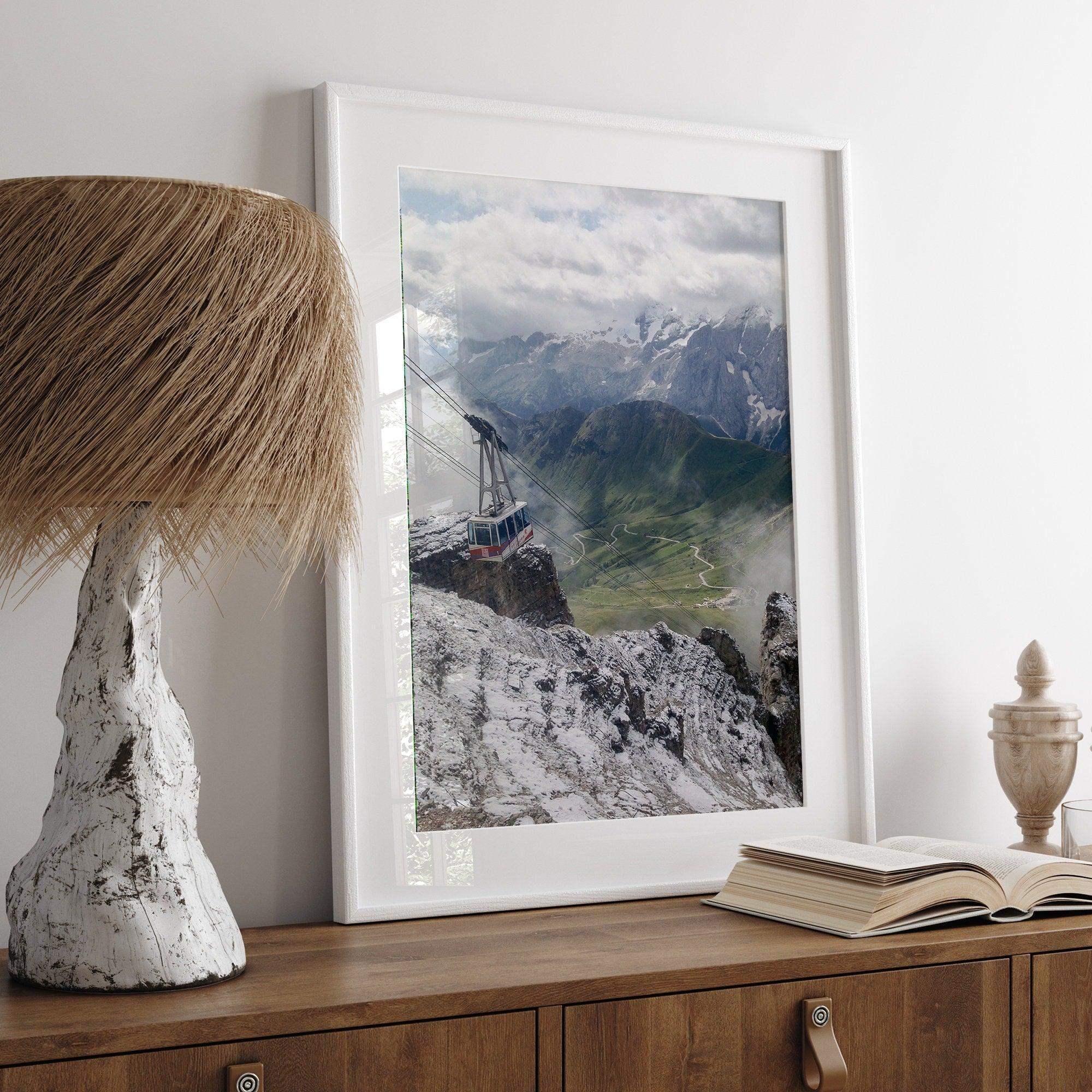 Step into the breathtaking view from the top of Pordoi Pass in the Dolomites Mountains with this fine art Northern Italy photography print. This mountain wall art showcases the green valley and snow-covered mountains.