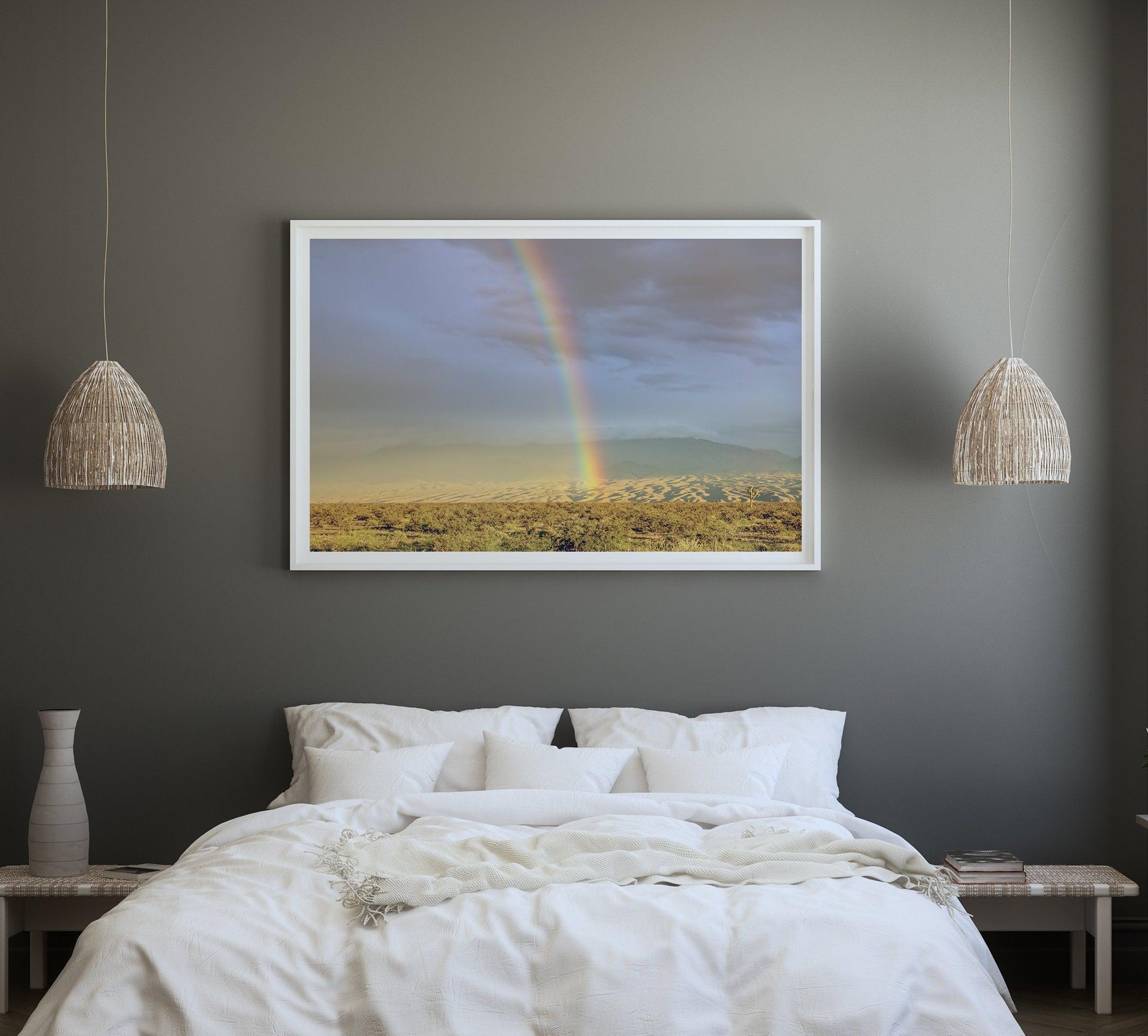 A fine art unframed or framed Arizona desert print showcasing a beautiful rainbow and cloudy sky in the middle of the desert landscape.