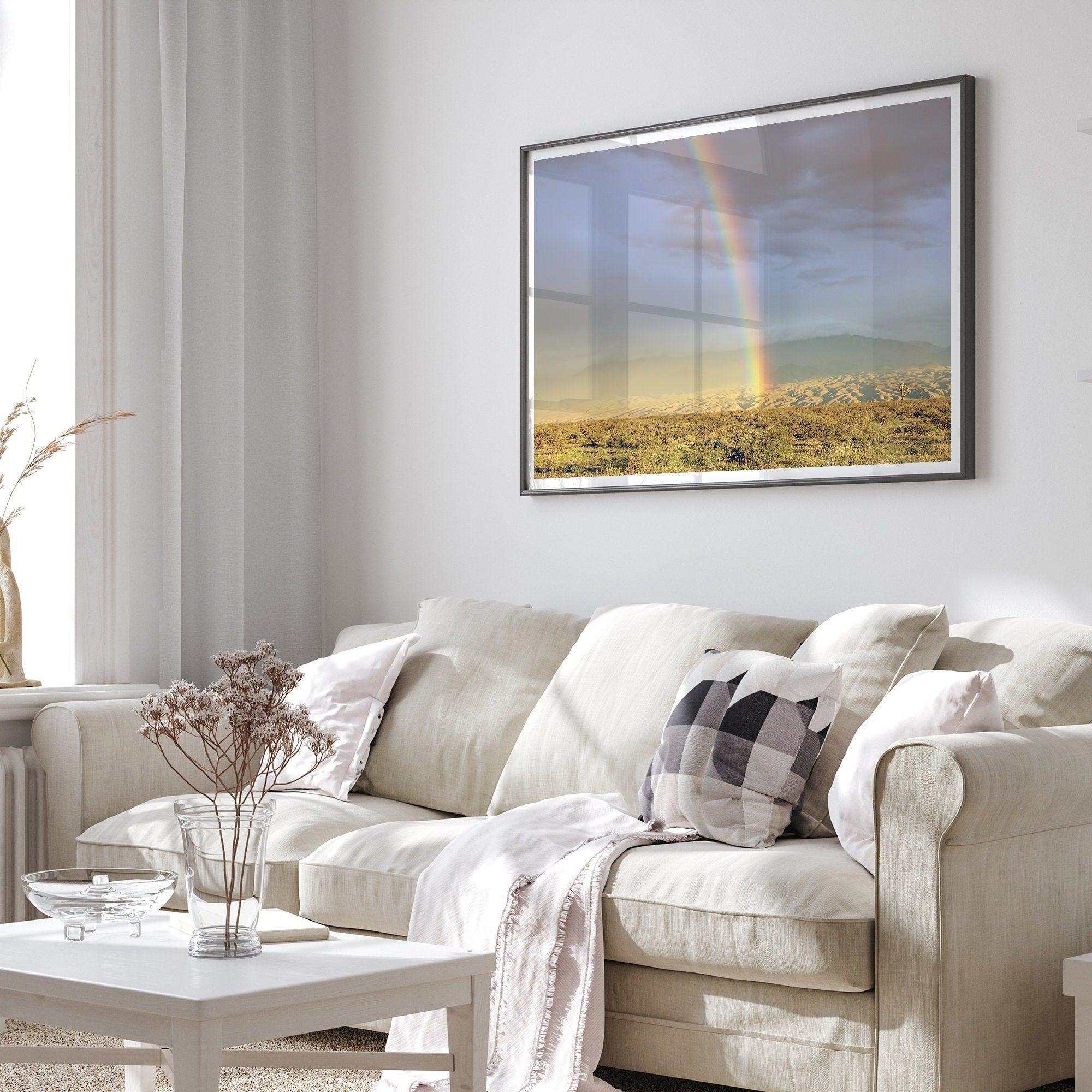 A fine art unframed or framed Arizona desert print showcasing a beautiful rainbow and cloudy sky in the middle of the desert landscape.