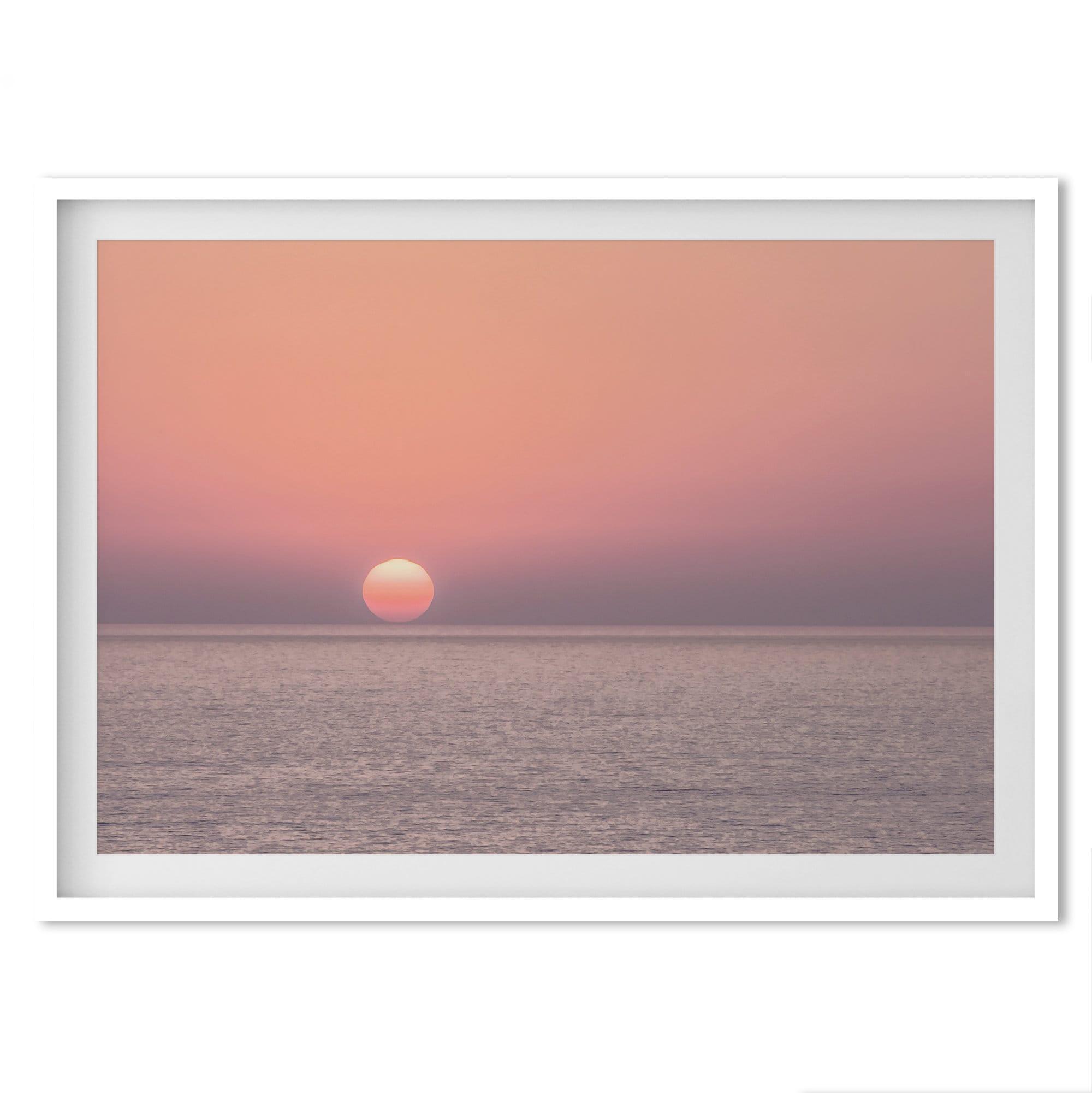 A fine art abstract ocean sunset print featuring rich shades of red, orange, and pink. This ocean wall art will add warmth and beauty to any room in your home.