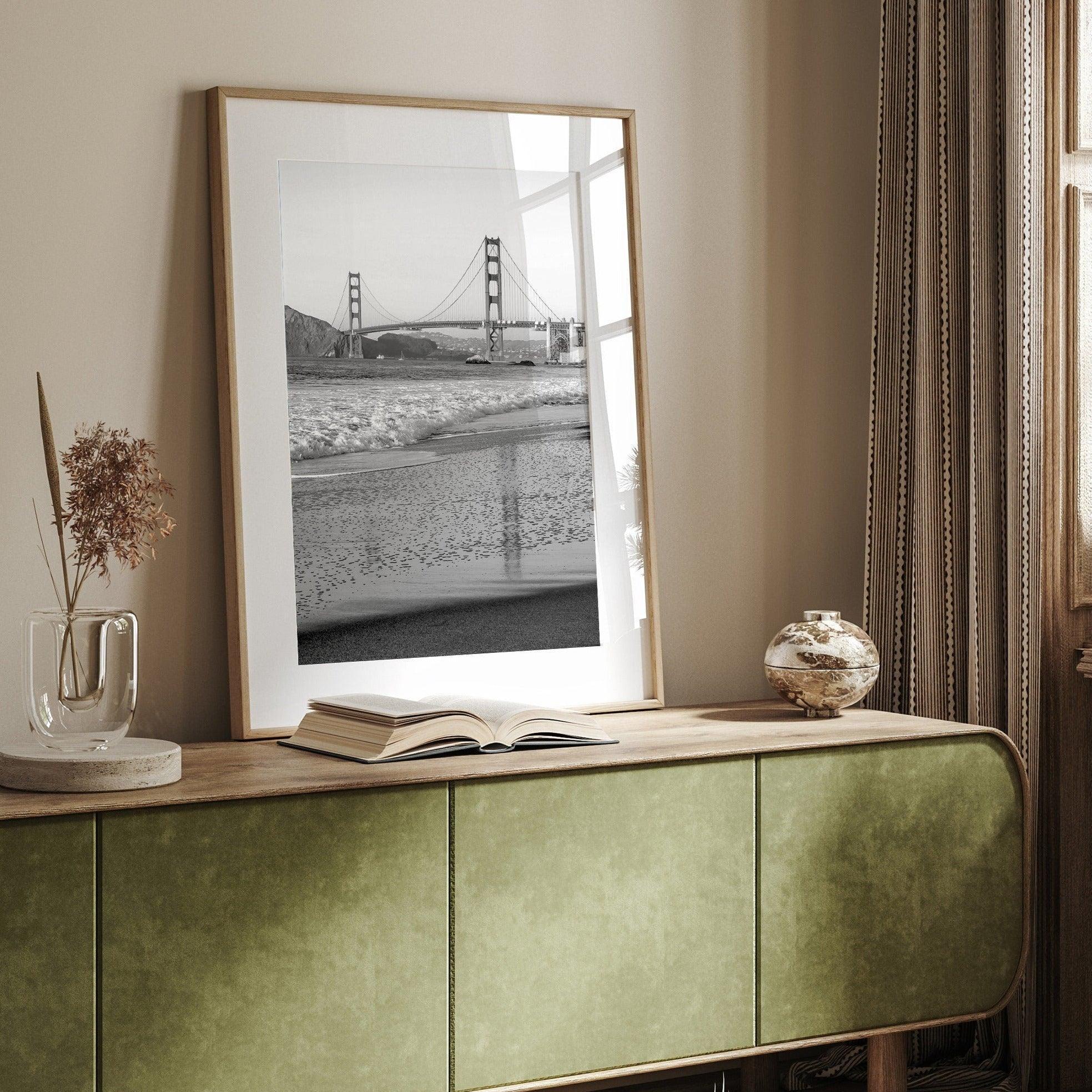 A fine art black and white print of the Golden Gate Bridge in San Francisco. This photo was taken from Baker Beach, showing the beautiful reflection of the bridge in the ocean. It is an excellent addition to your wall decor or a San Francisco gift.