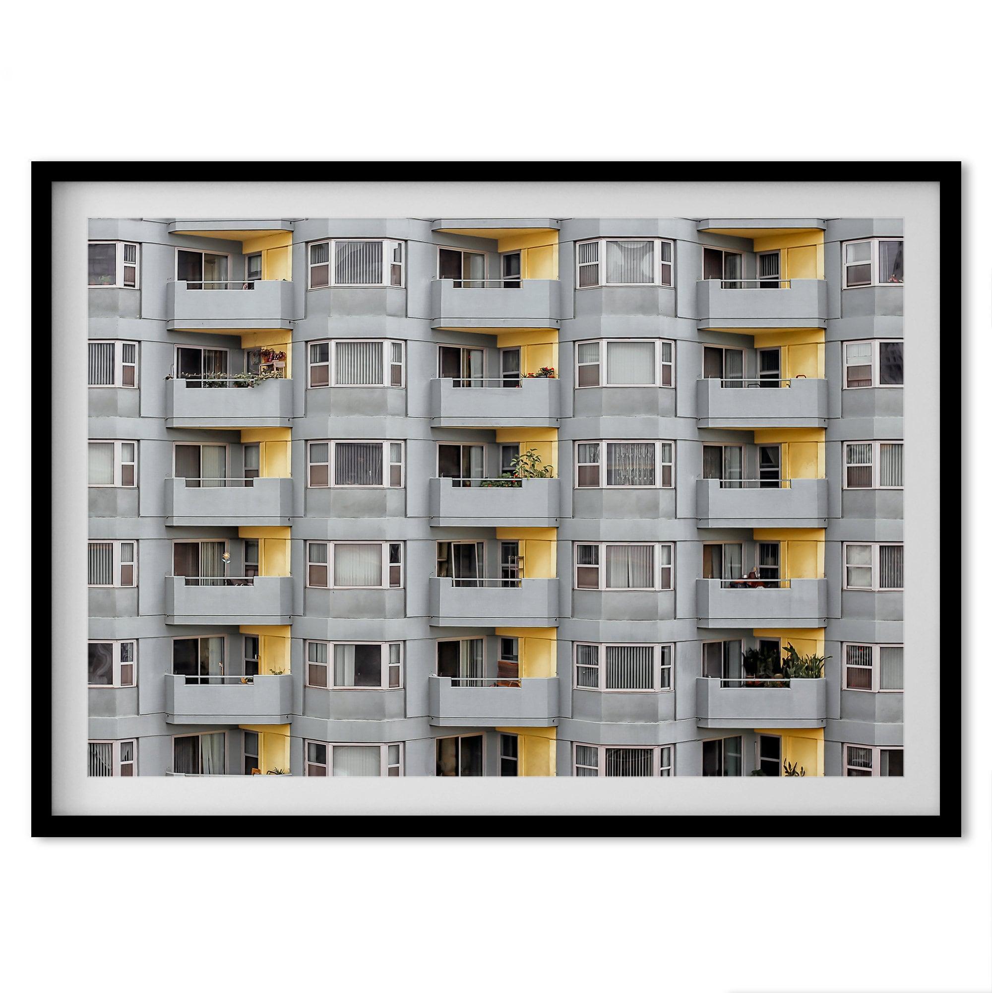 A fine art San Francisco minimalist architecture print of a unique modern building with colorful yellow balconies.