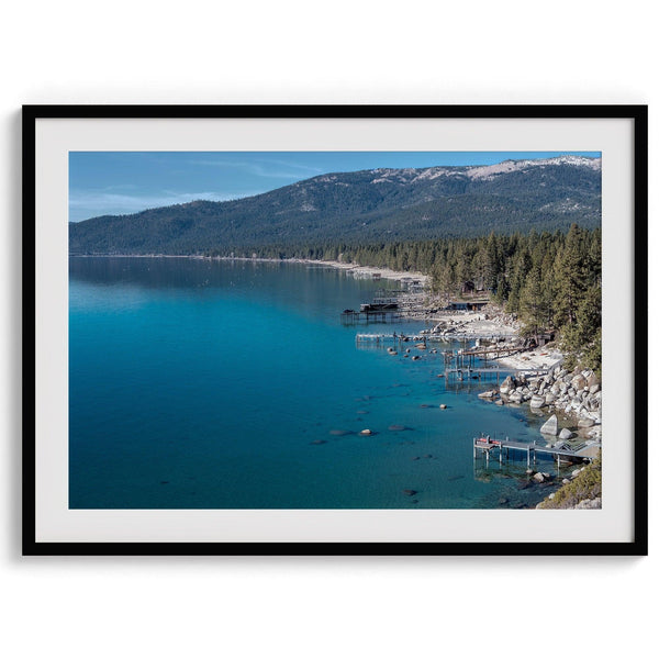 Captivating fine art print of Lake Tahoe showcasing docks, boats, beachfront, lush forest, majestic mountain, and serene waters, capturing the essence of lake life in Incline Village, Nevada.