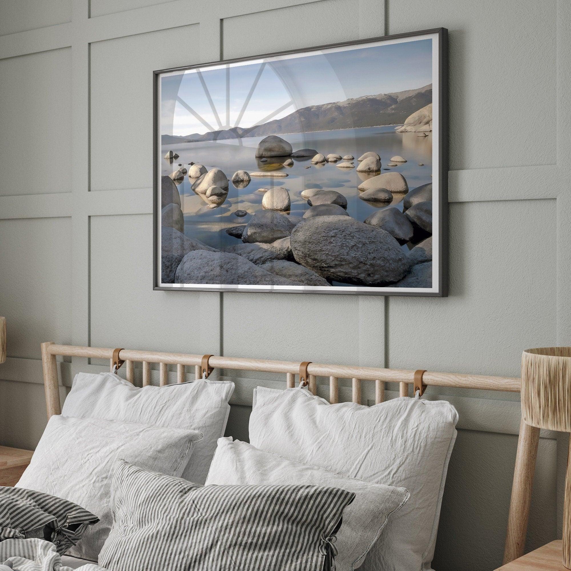 This breathtaking fine art Lake Tahoe print captures the perfect shape of the huge rocks that rise from the crystal-clear water, creating a beautiful contrast against the blue sky and the distant mountain range.