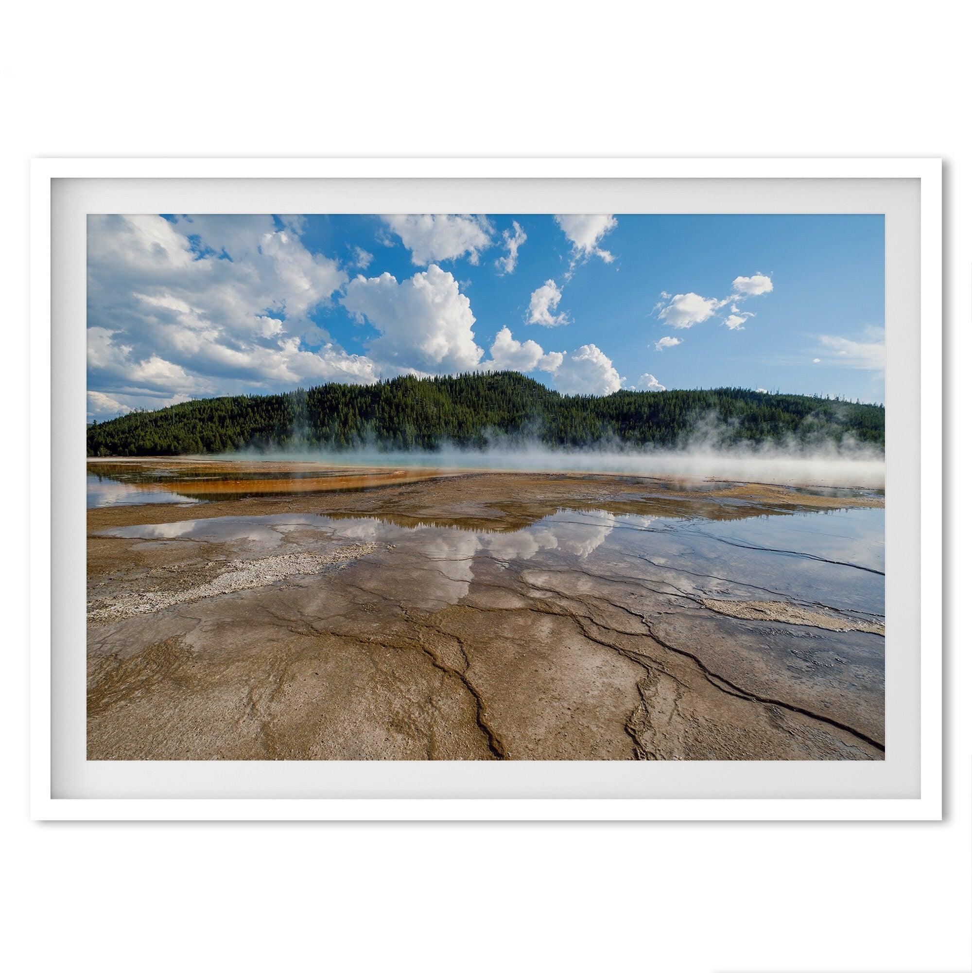 A fine art framed or unframed print of the stunning Grant Prismatic hot springs in Yellowstone National Park. This nature wall art showcases the beautiful geometrical shapes and cloud reflections in the hot spring water.