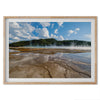 A fine art framed or unframed print of the stunning Grant Prismatic hot springs in Yellowstone National Park. This nature wall art showcases the beautiful geometrical shapes and cloud reflections in the hot spring water.