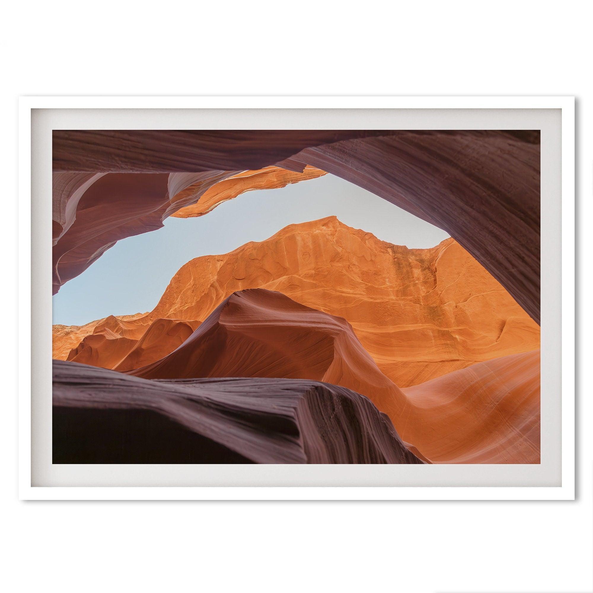 A framed fine art Arizona desert print of Antelope Canyon featuring three layers of rocks in varying colors and creamy textures that create a stunning minimalist desert landscape photography wall art.