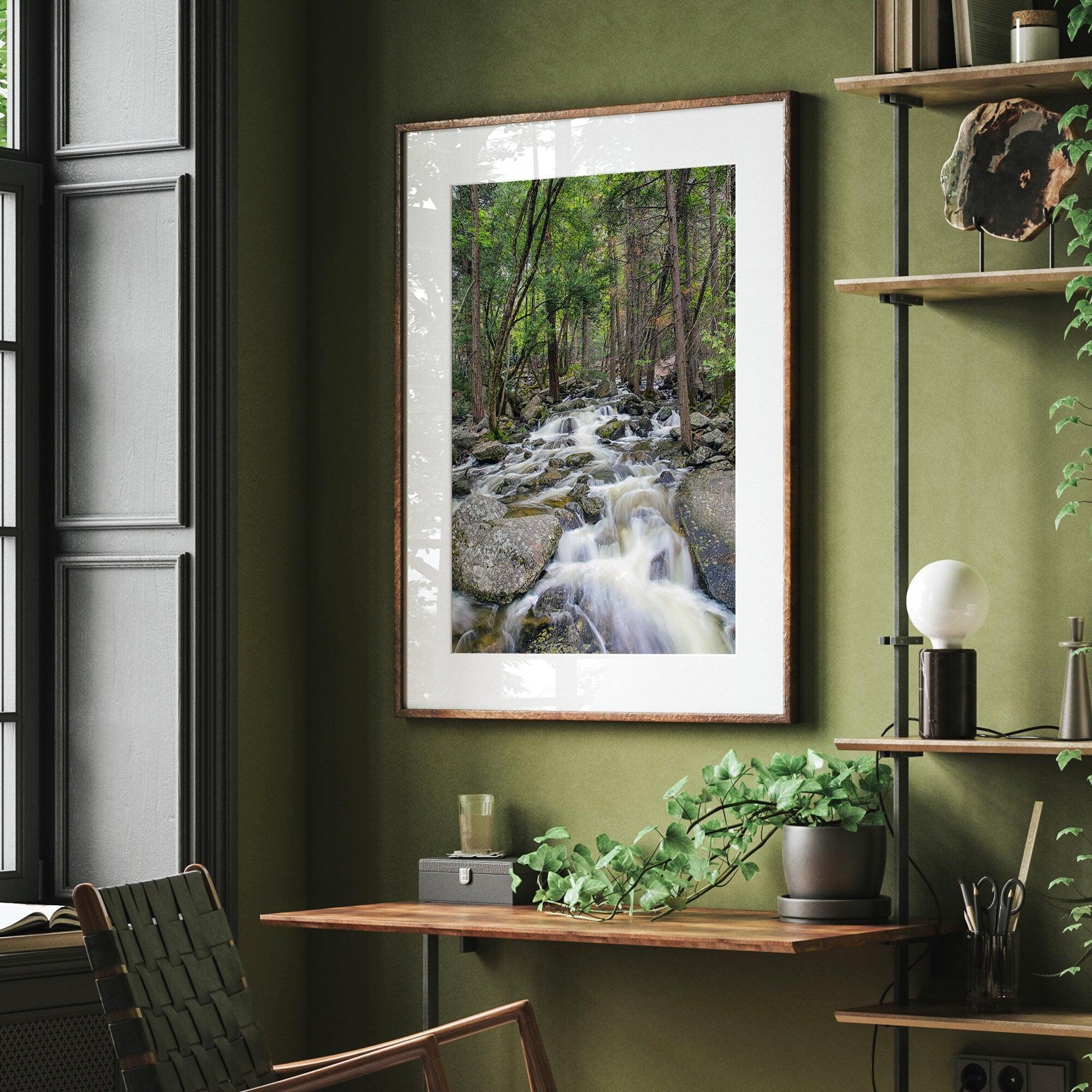 A beautiful river cuts through the forest, shot in long exposure making the water look creamy and calm in this fine art Yosemite National Park print.